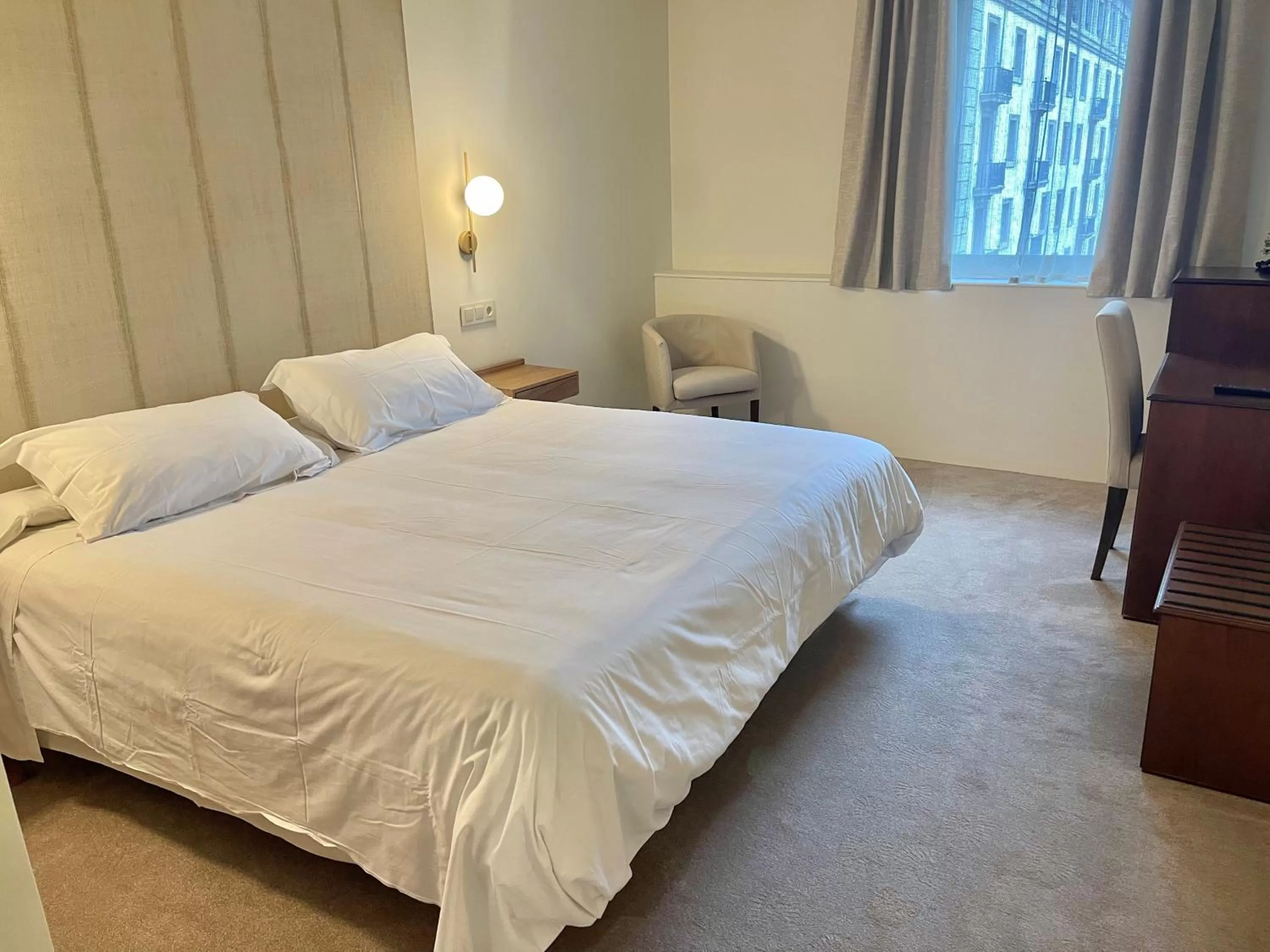 Bed in Hotel Oriente