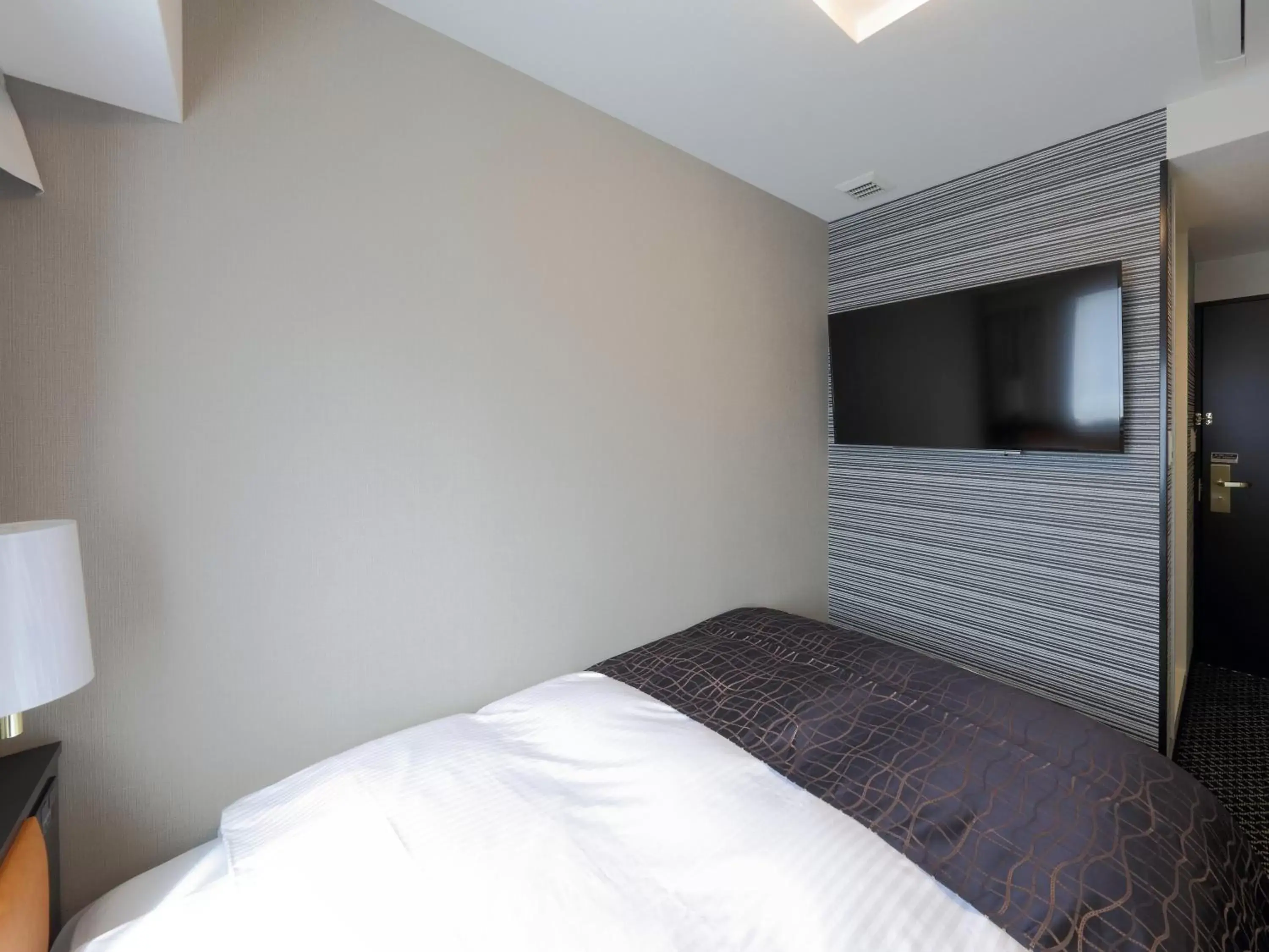 Photo of the whole room, Bed in APA Hotel Nagoya Sakae Kita Photo of the whole room, Bed in APA Hotel Nagoya Sakae Kita