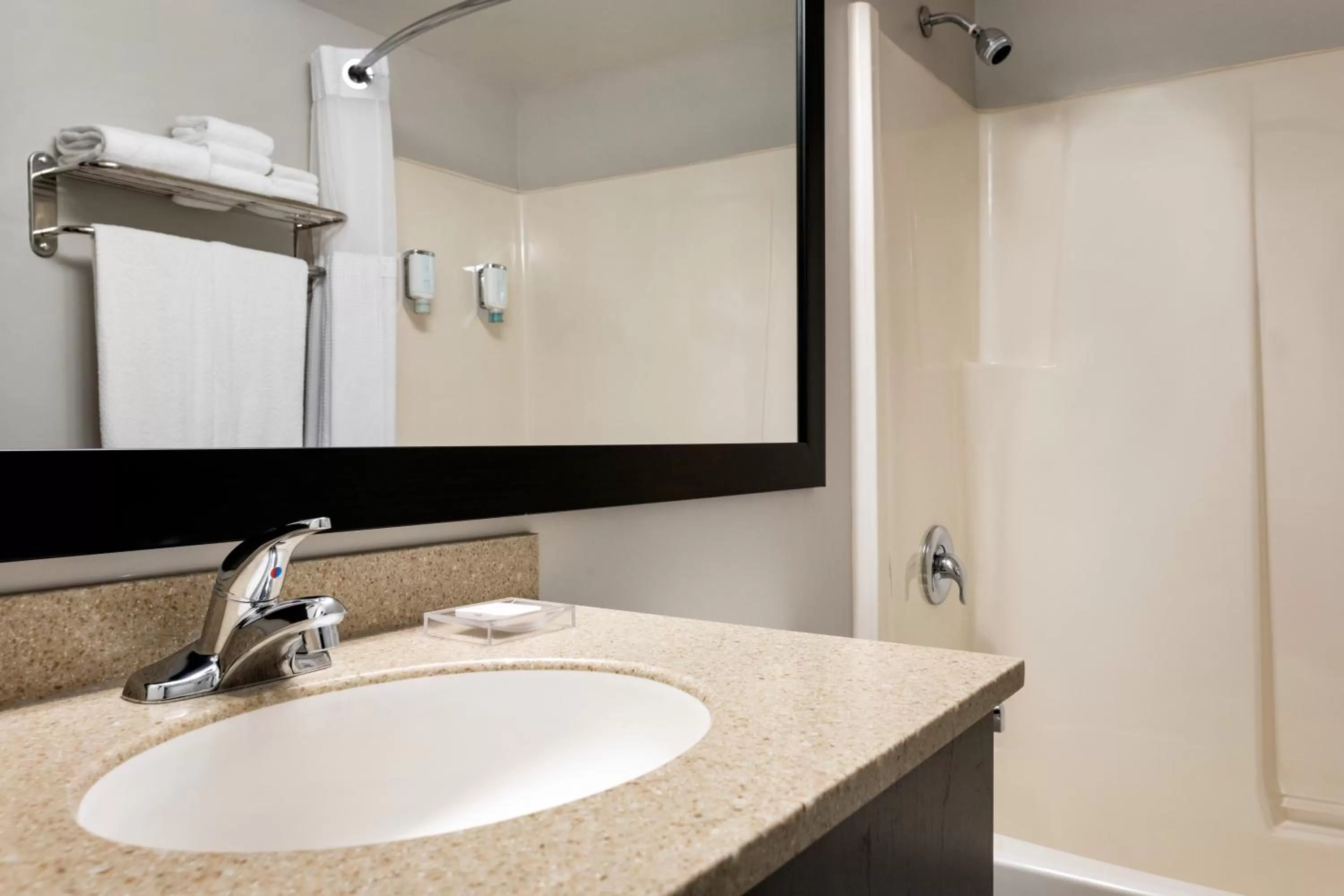 Bathroom in Travelodge Suites by Wyndham New Glasgow