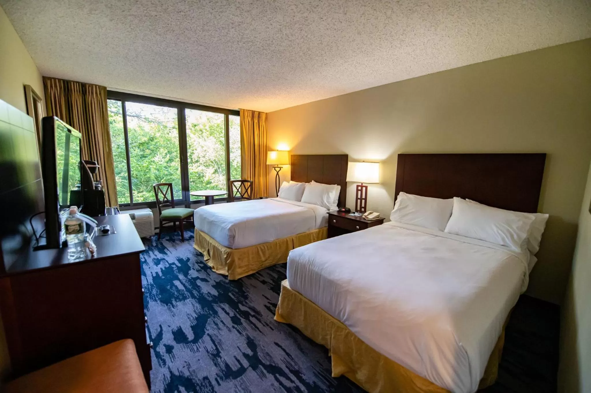 Bed in Holiday Inn Bar Harbor Regency Hotel by IHG