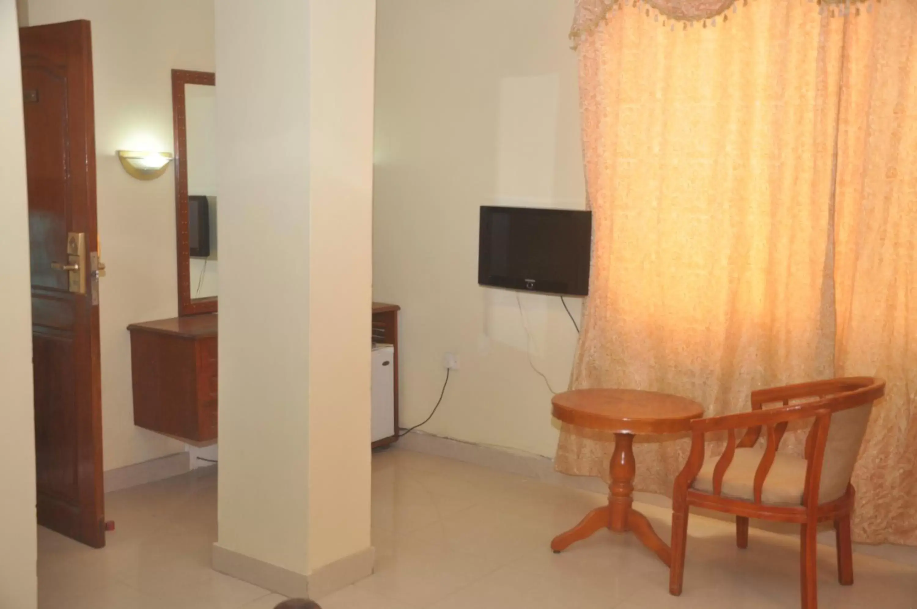 Seating area, TV/Entertainment Center in Iris Hotel Dar Es Salaam