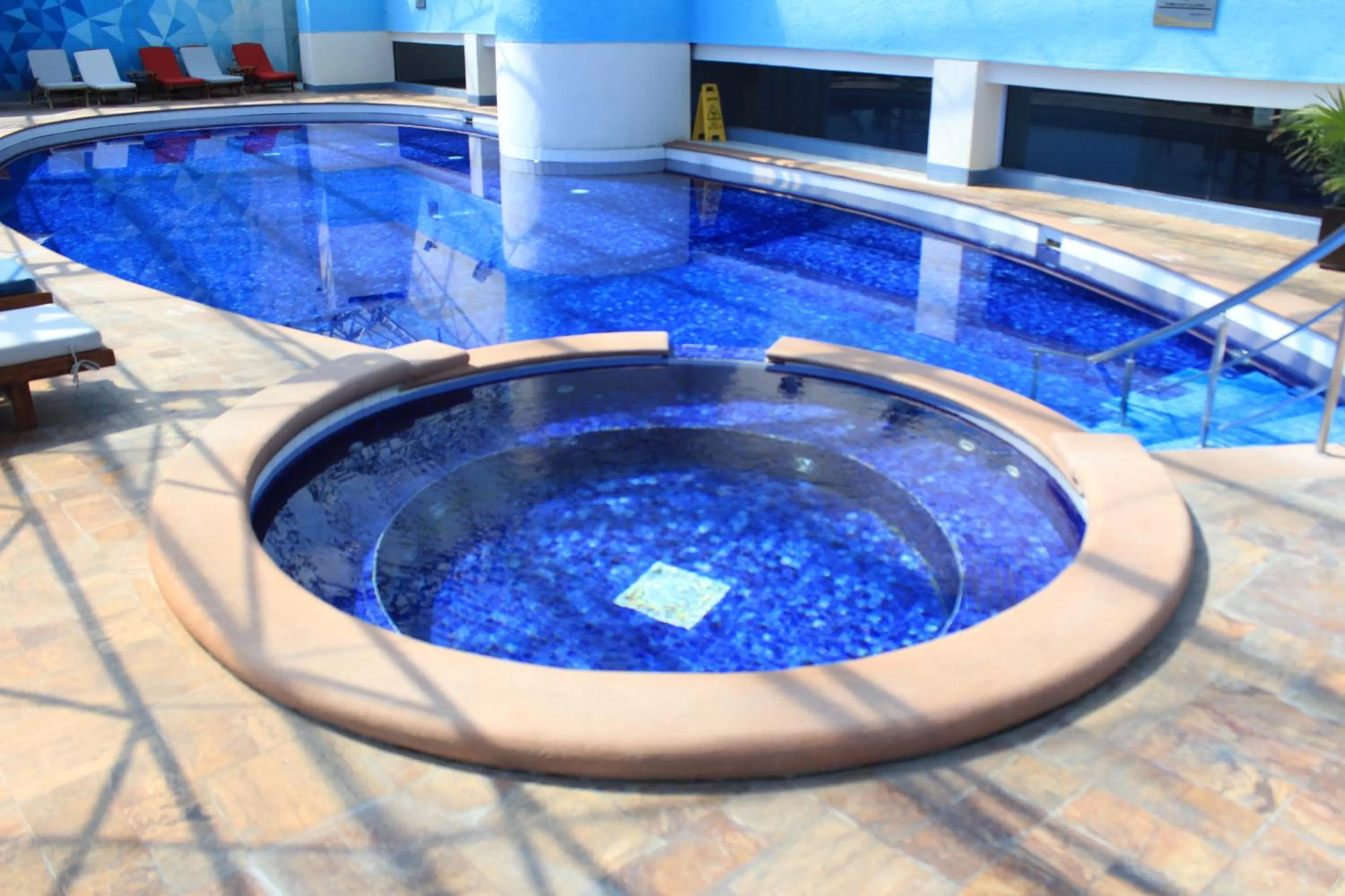 Swimming pool in Holiday Inn Puebla Finsa by IHG