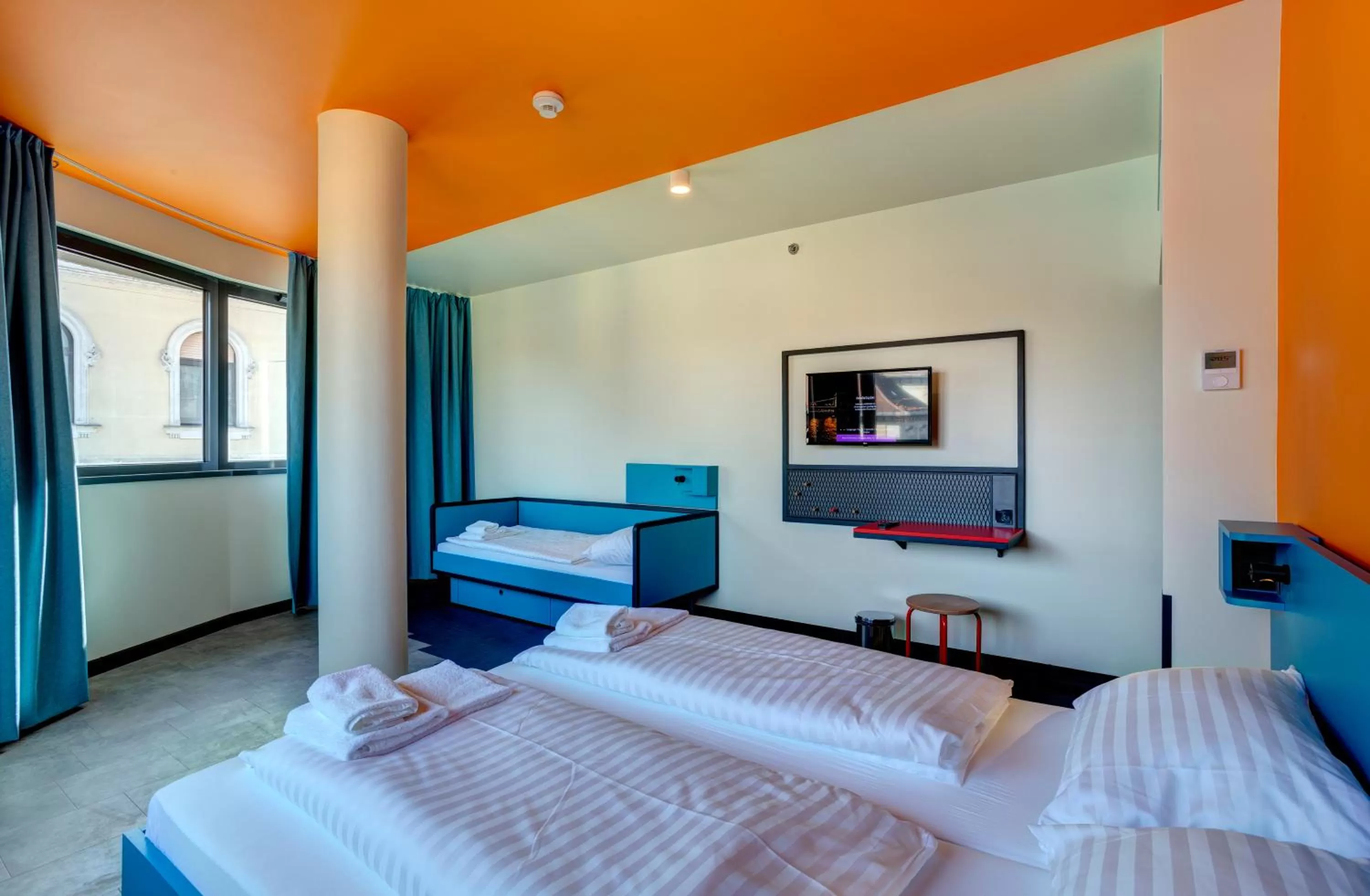 Photo of the whole room, Bed in MEININGER Budapest Great Market Hall