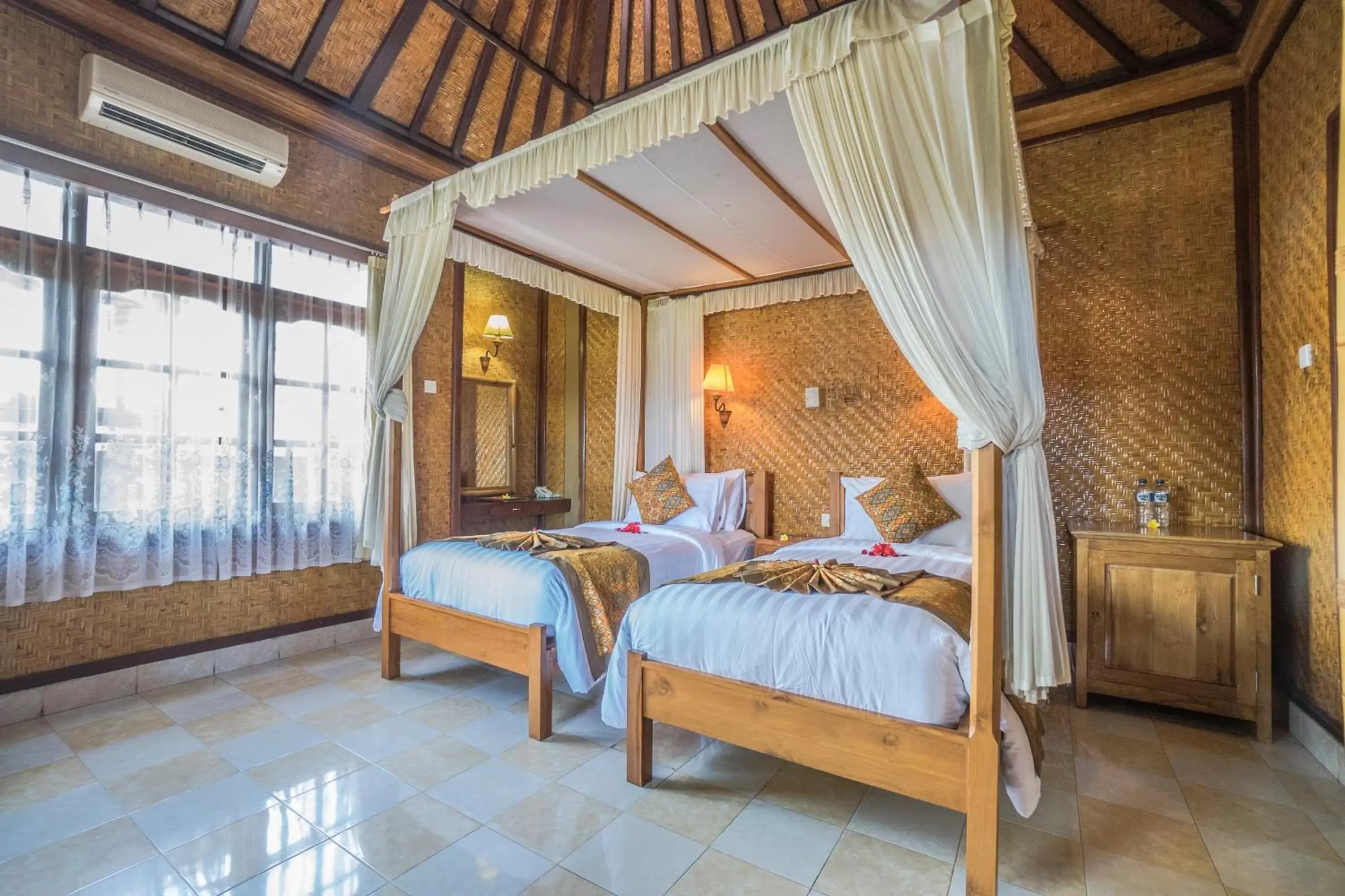 Bedroom, Bed in Cendana Resort & Spa by Mahaputra Bedroom, Bed in Cendana Resort & Spa by Mahaputra