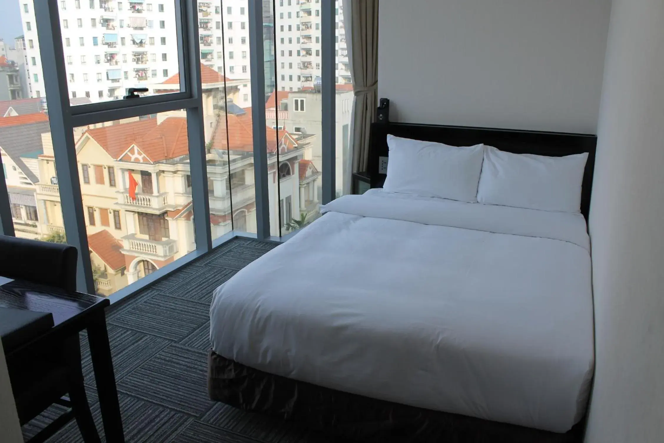 Bed in Sakura Hotel 2