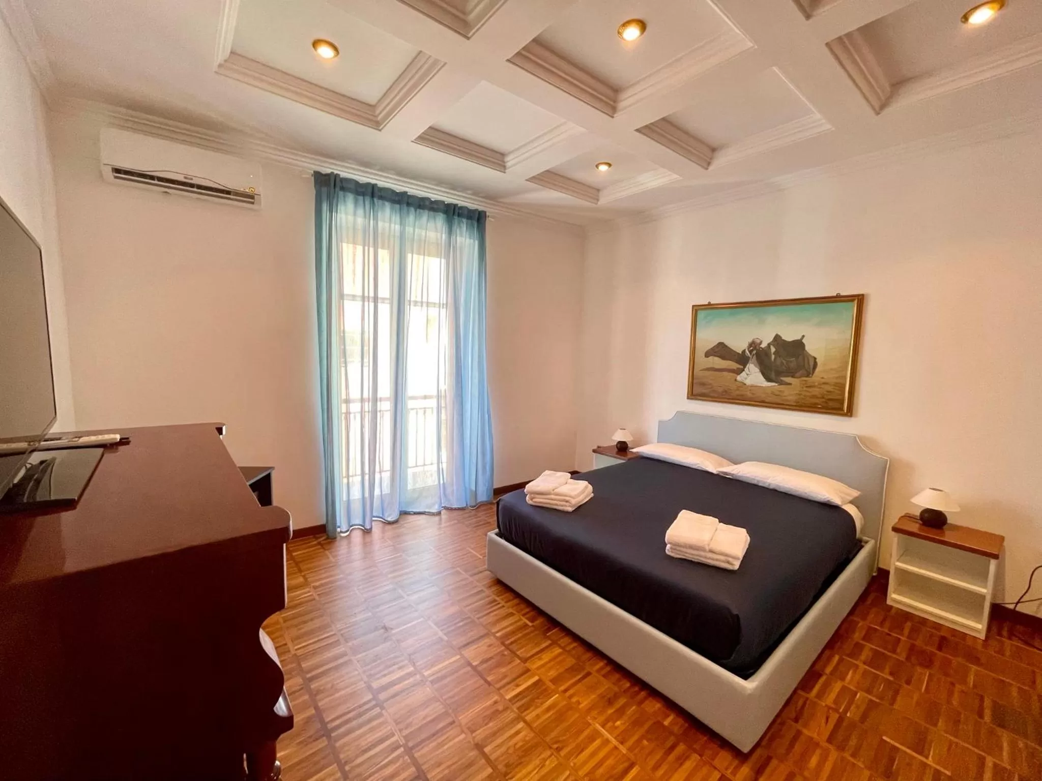 Bed in Tribus Boutique Hotel