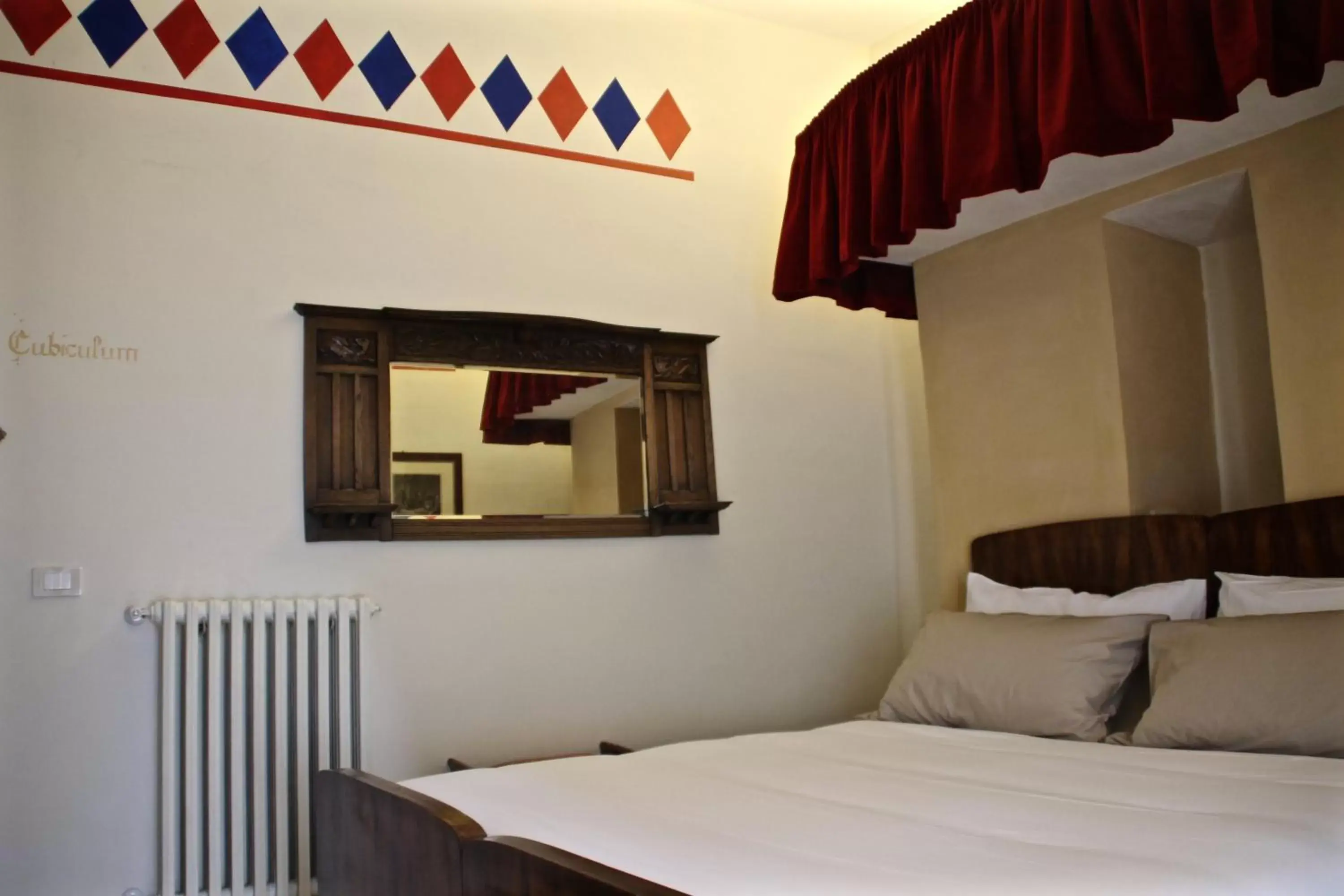 Photo of the whole room, Bed in Antica Corte del Castello