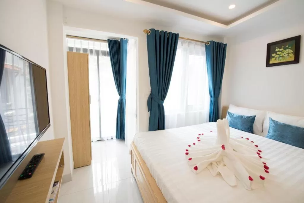 Bed in Hanoi Holiday Hotel