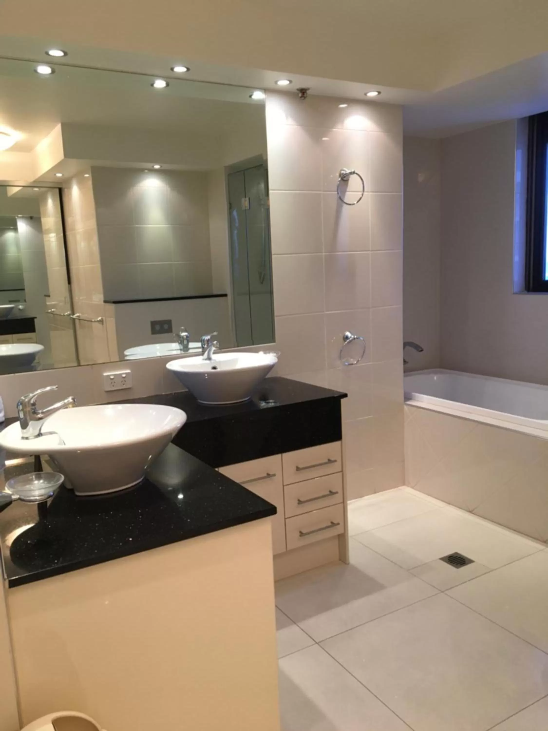 Bathroom in Surfers Century Oceanside Apartments