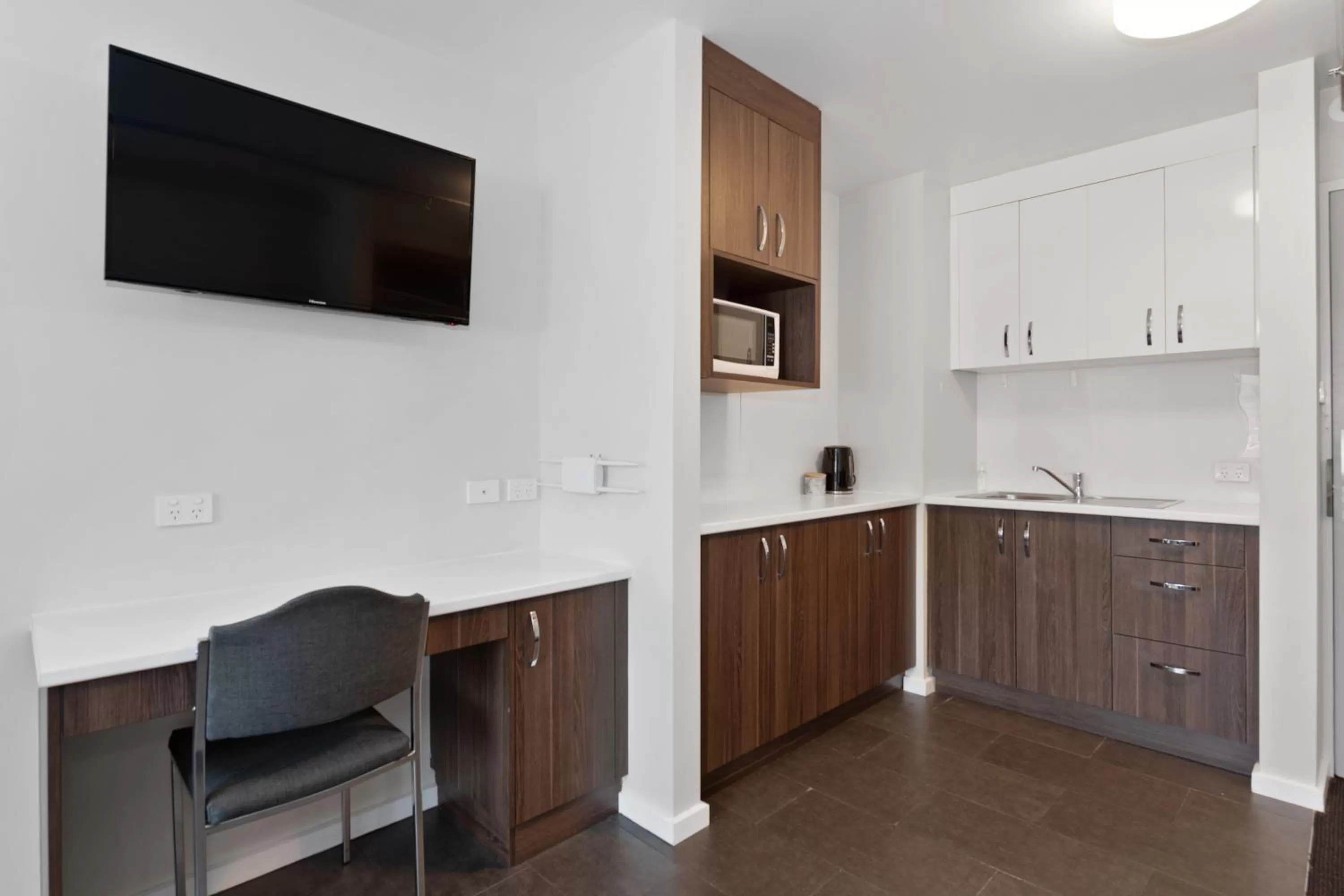 Kitchen or kitchenette in Allurity Hotel