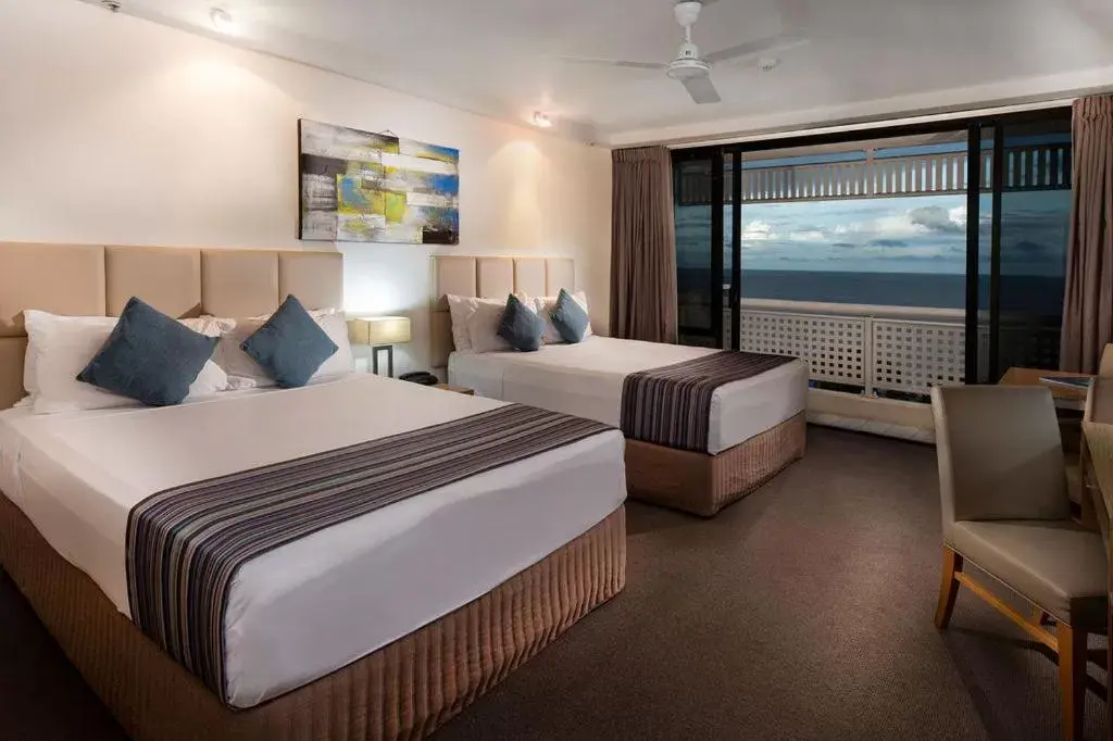 Bed in Rydges Esplanade Resort Cairns