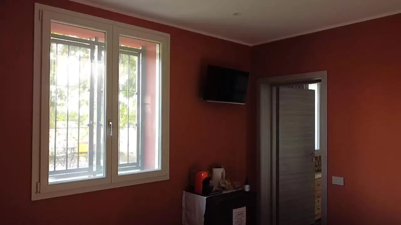 TV/Entertainment Center in Sala dell Estate Guest House