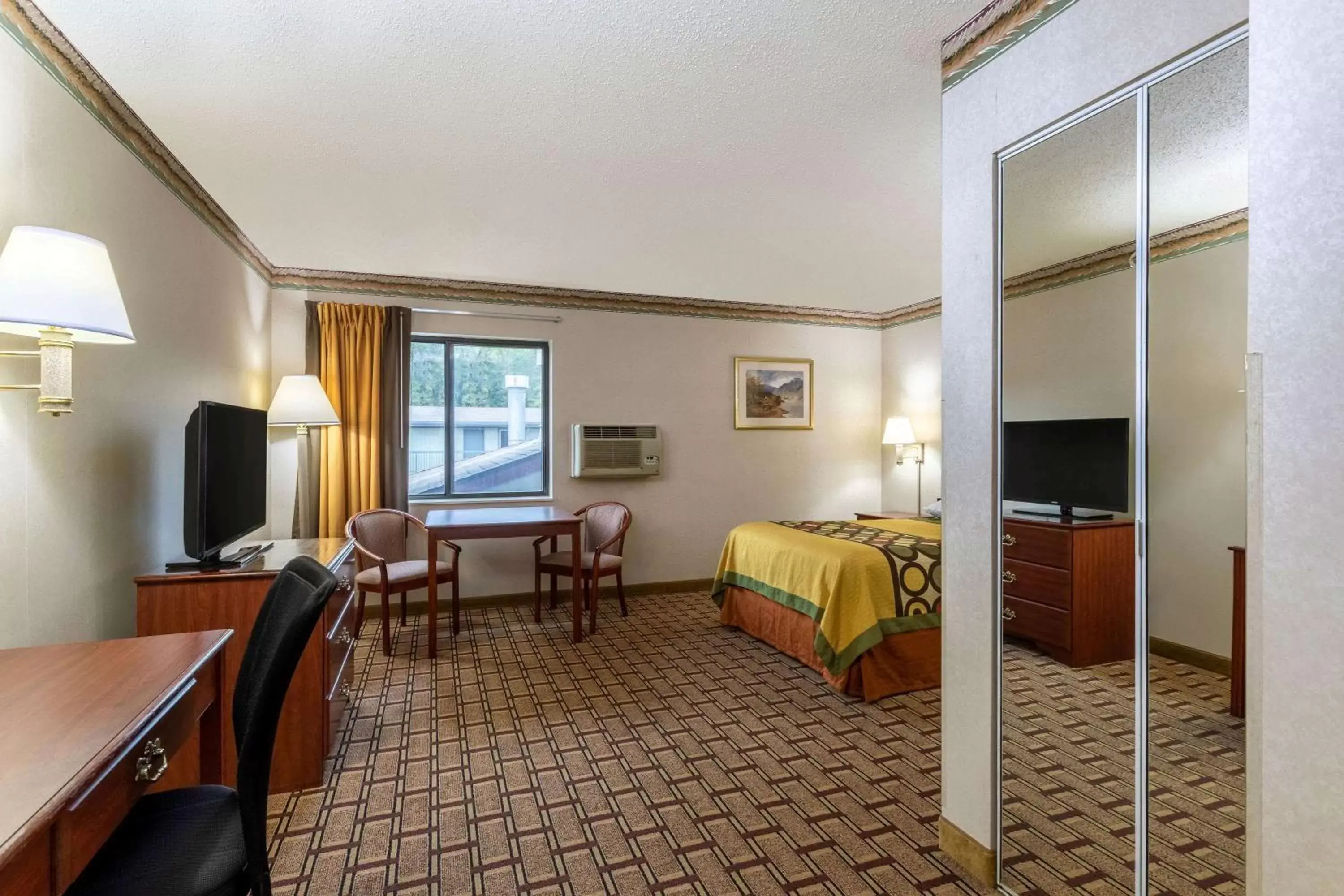 Photo of the whole room, TV/Entertainment Center in Super 8 by Wyndham Marysville/Port Huron Area