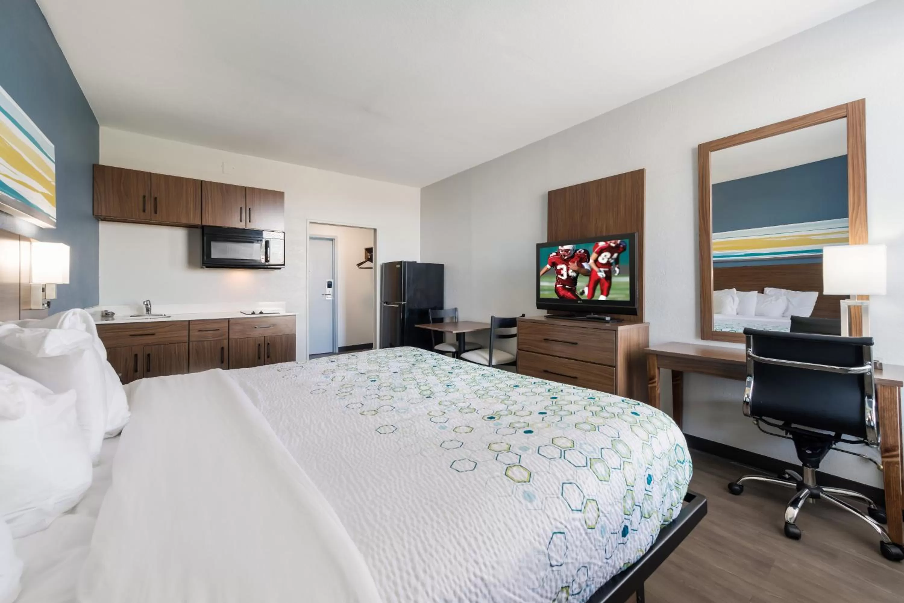 Bedroom, Bed in HomeTowne Studios by Red Roof Newport News - Hampton West