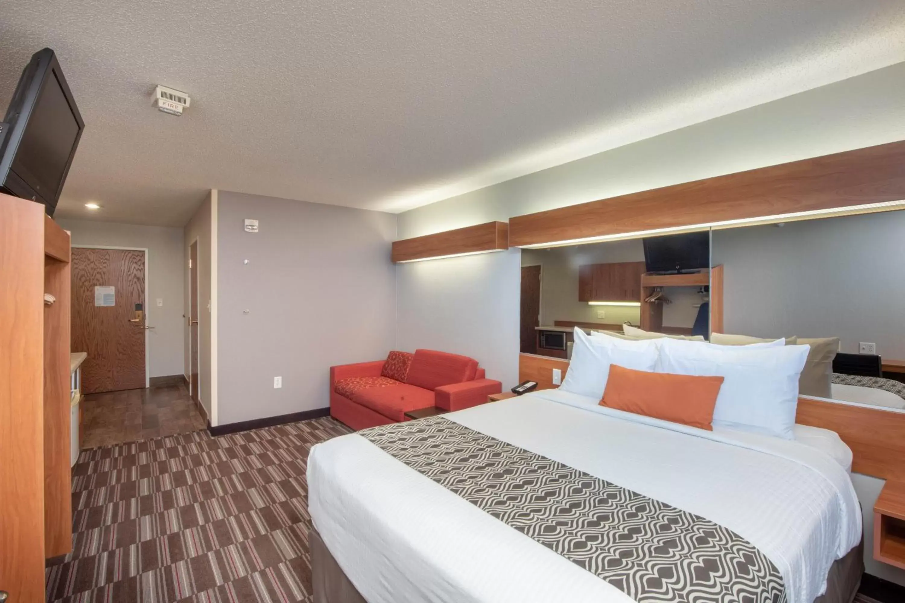 Bed in Microtel Inn & Suites by Wyndham Springfield