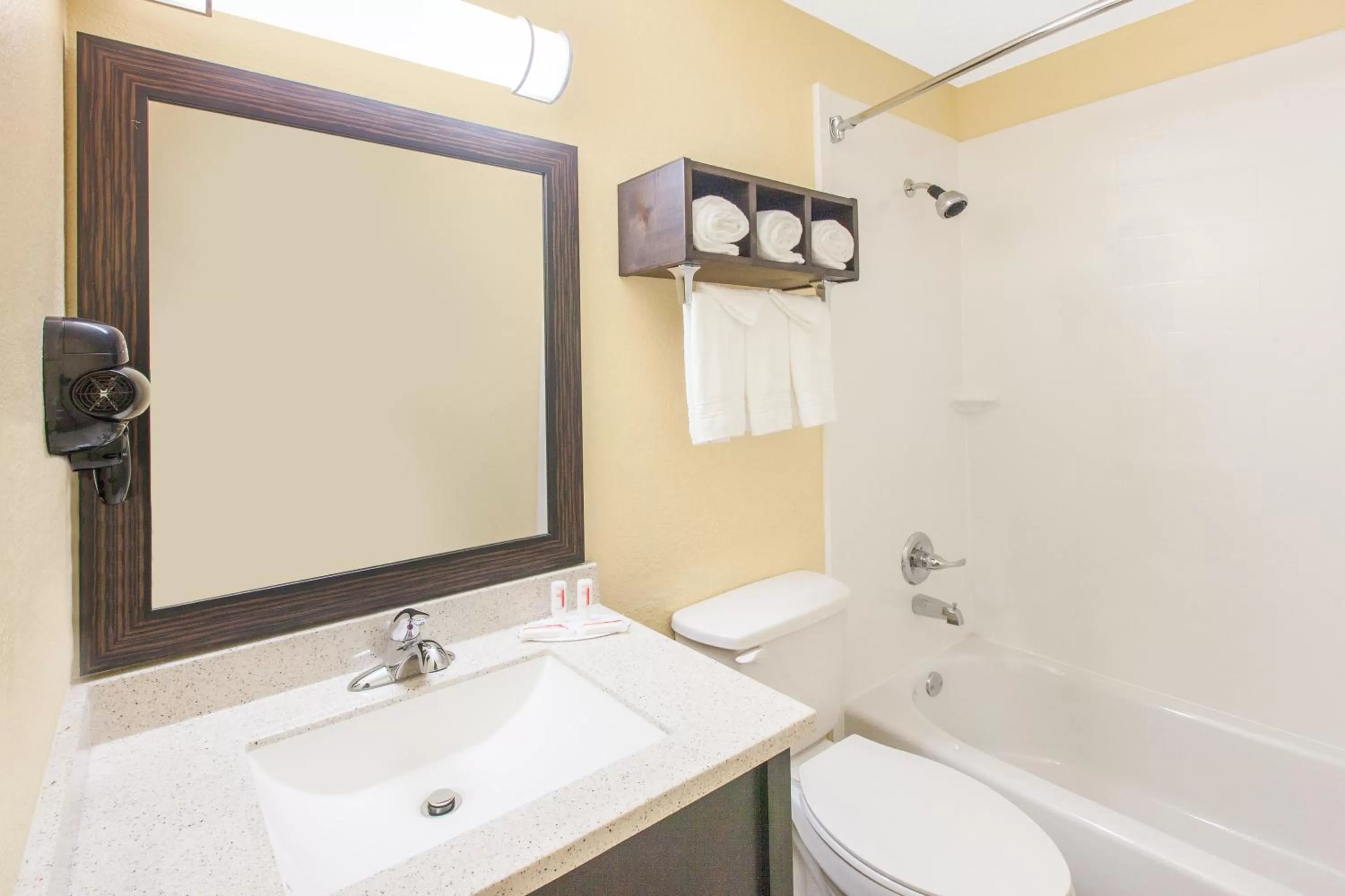 Toilet in Days Inn by Wyndham Miami