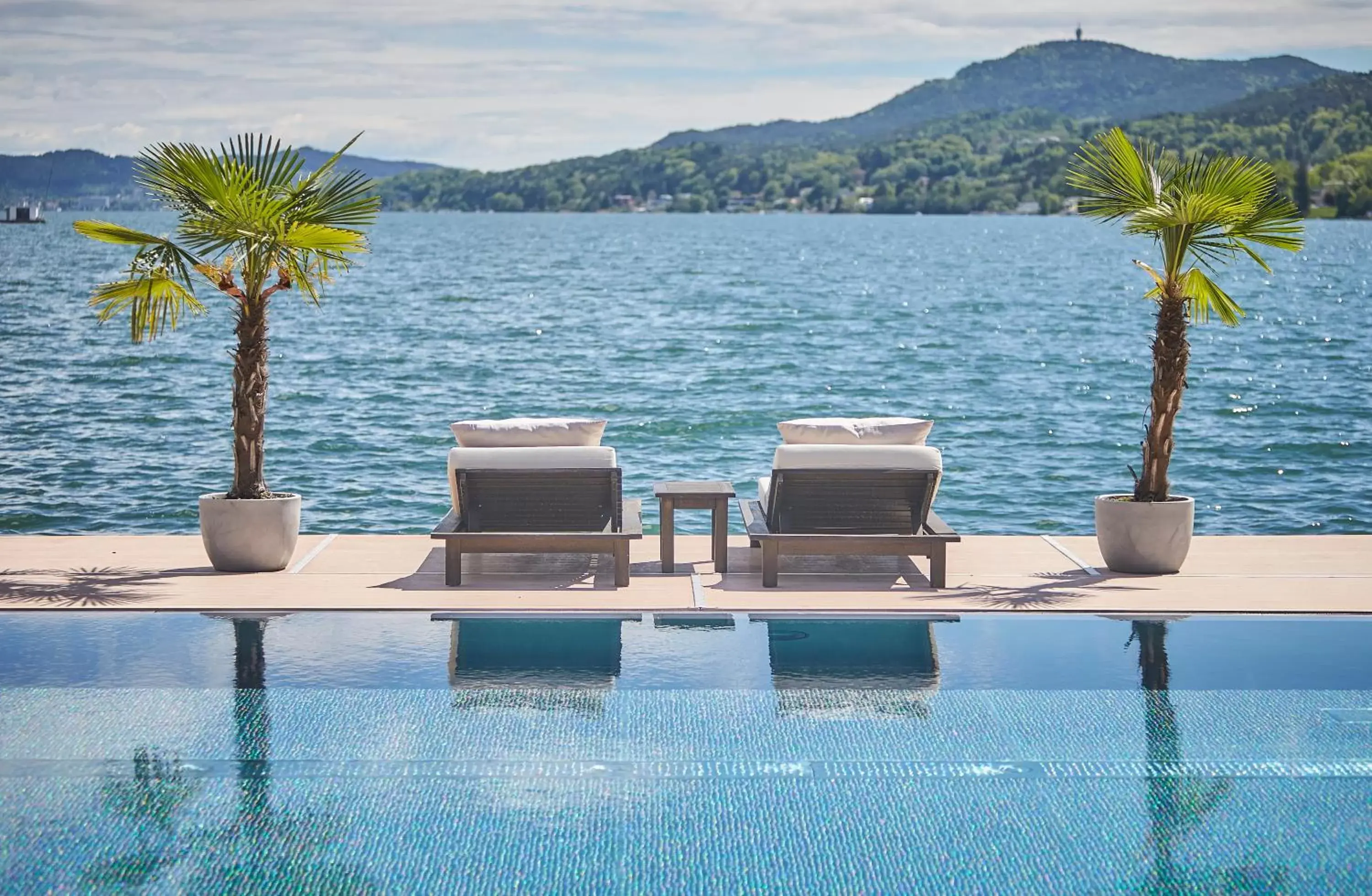 Lake view, Swimming Pool in Falkensteiner Schlosshotel Velden – The Leading Hotels of the World