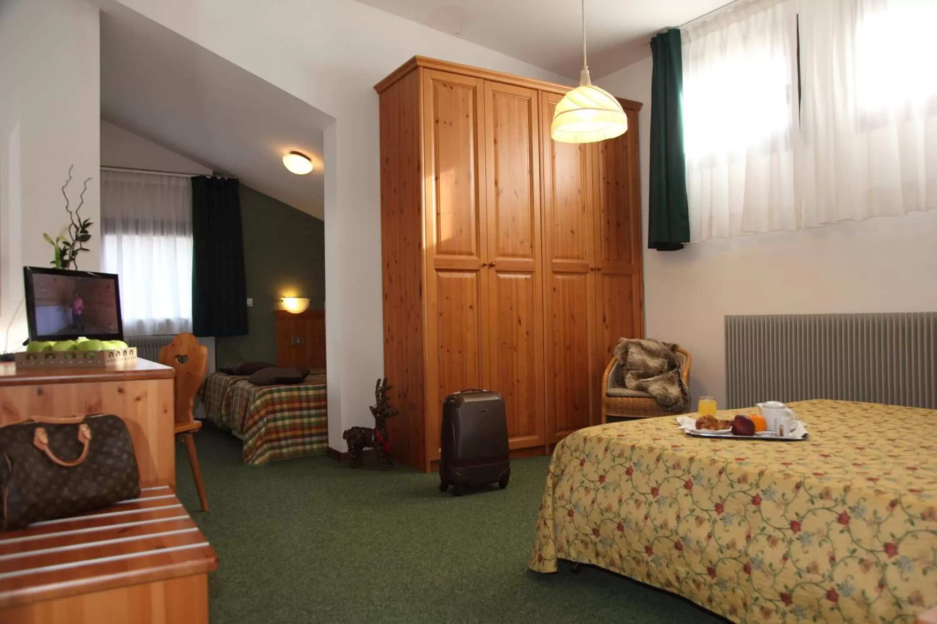 Quadruple Room with Balcony in Hotel Nigritella