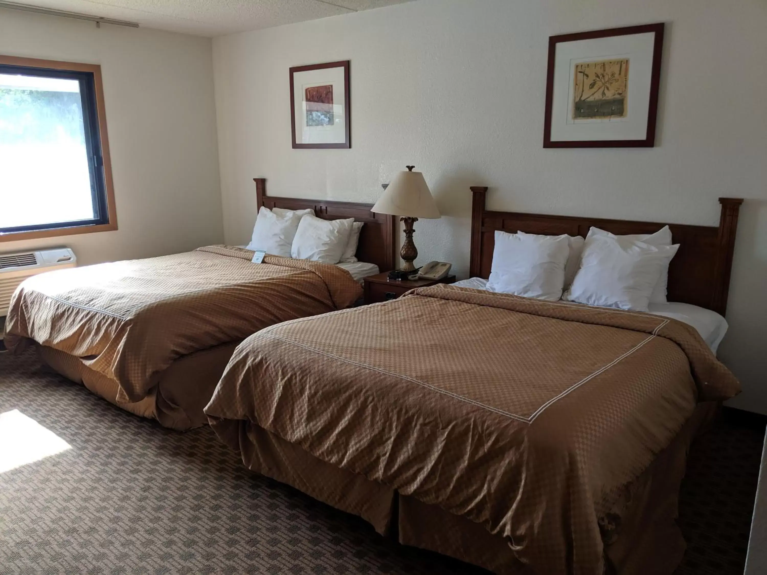 Bed in Boarders Inn and Suites by Cobblestone Hotels - Ripon Bed in Boarders Inn and Suites by Cobblestone Hotels - Ripon