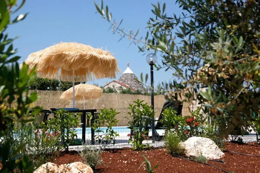 Swimming pool in L'Isola Felice e Trulli Sotto Le Stelle