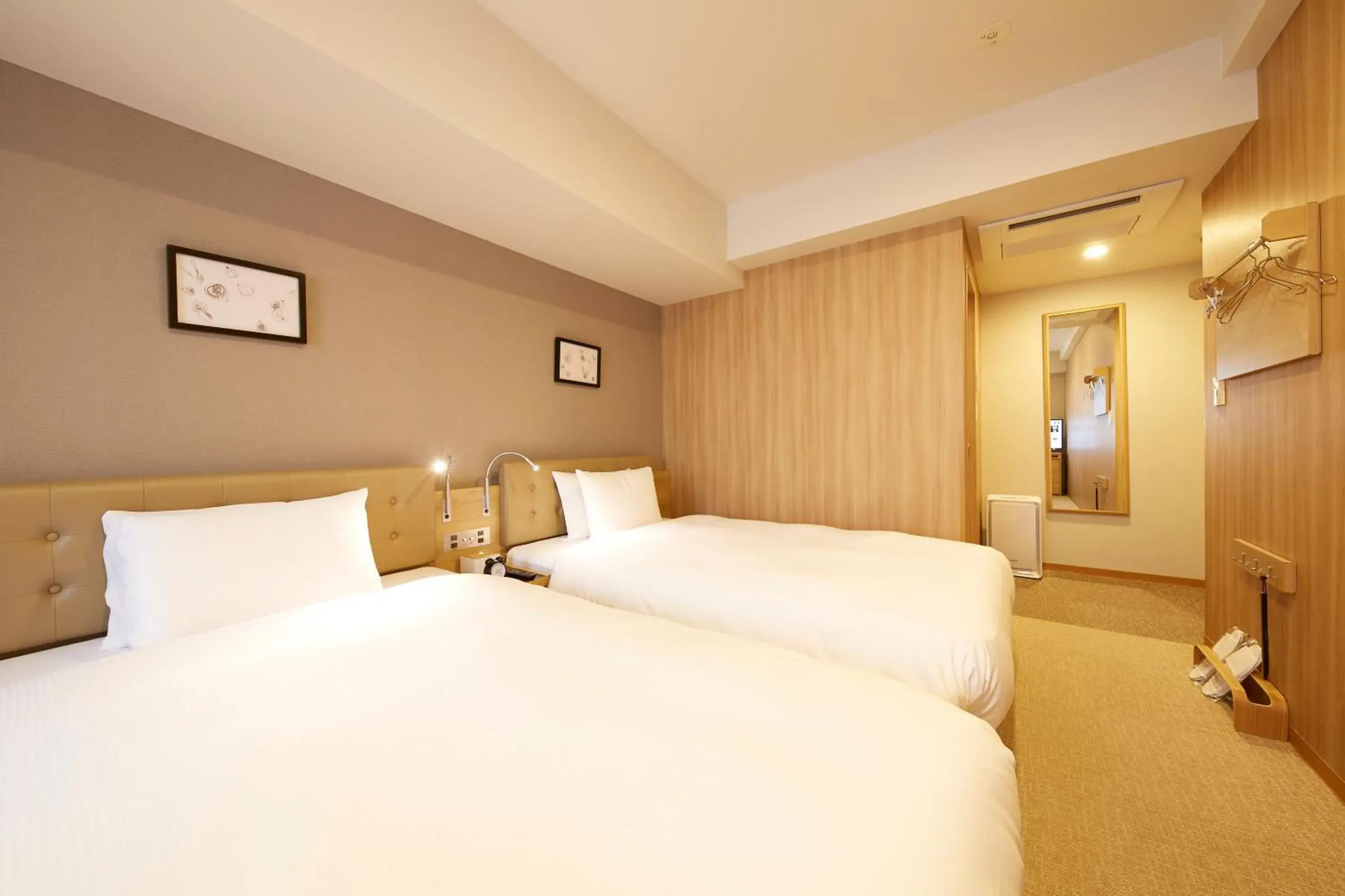 Bed in hotel MONday Haneda Airport