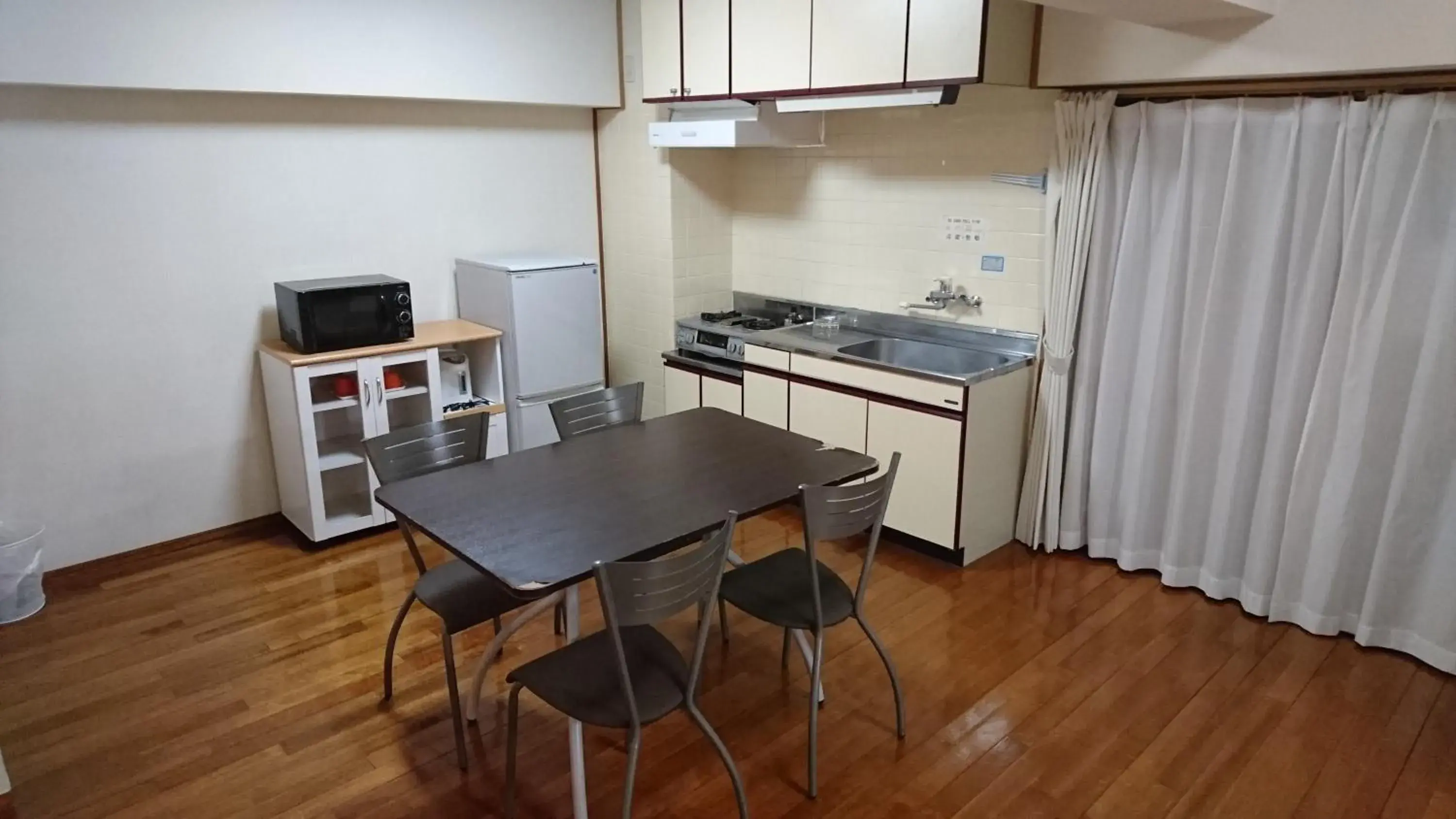 Kitchen/Kitchenette in Kokusai Towns Inn