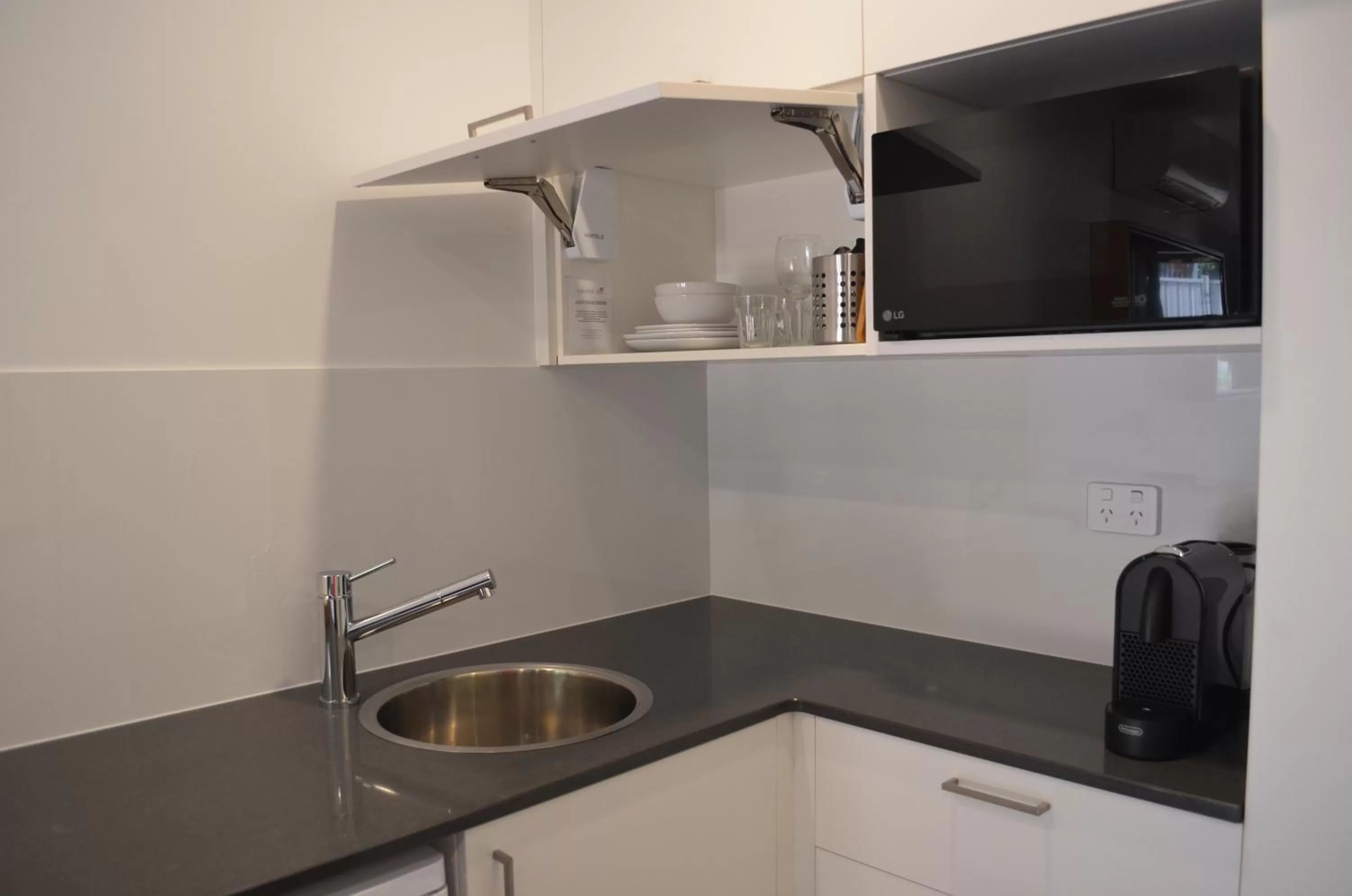 Kitchen or kitchenette in Bright Colonial Motel