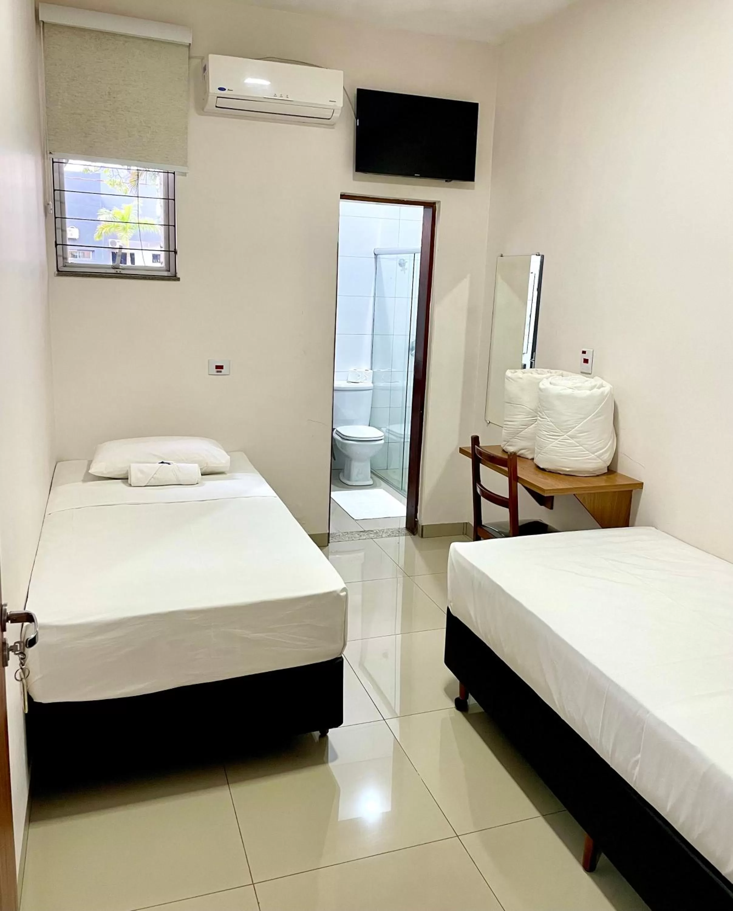 Bed in Nav Park Hotel