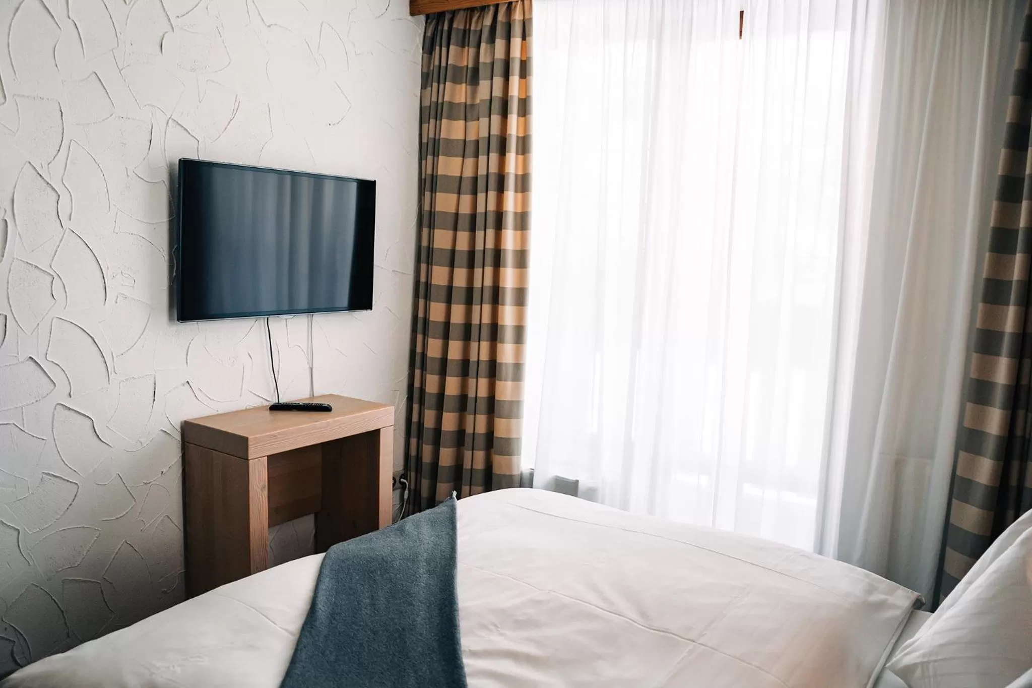 Living room, Bed in APLEND Hotel Kukučka