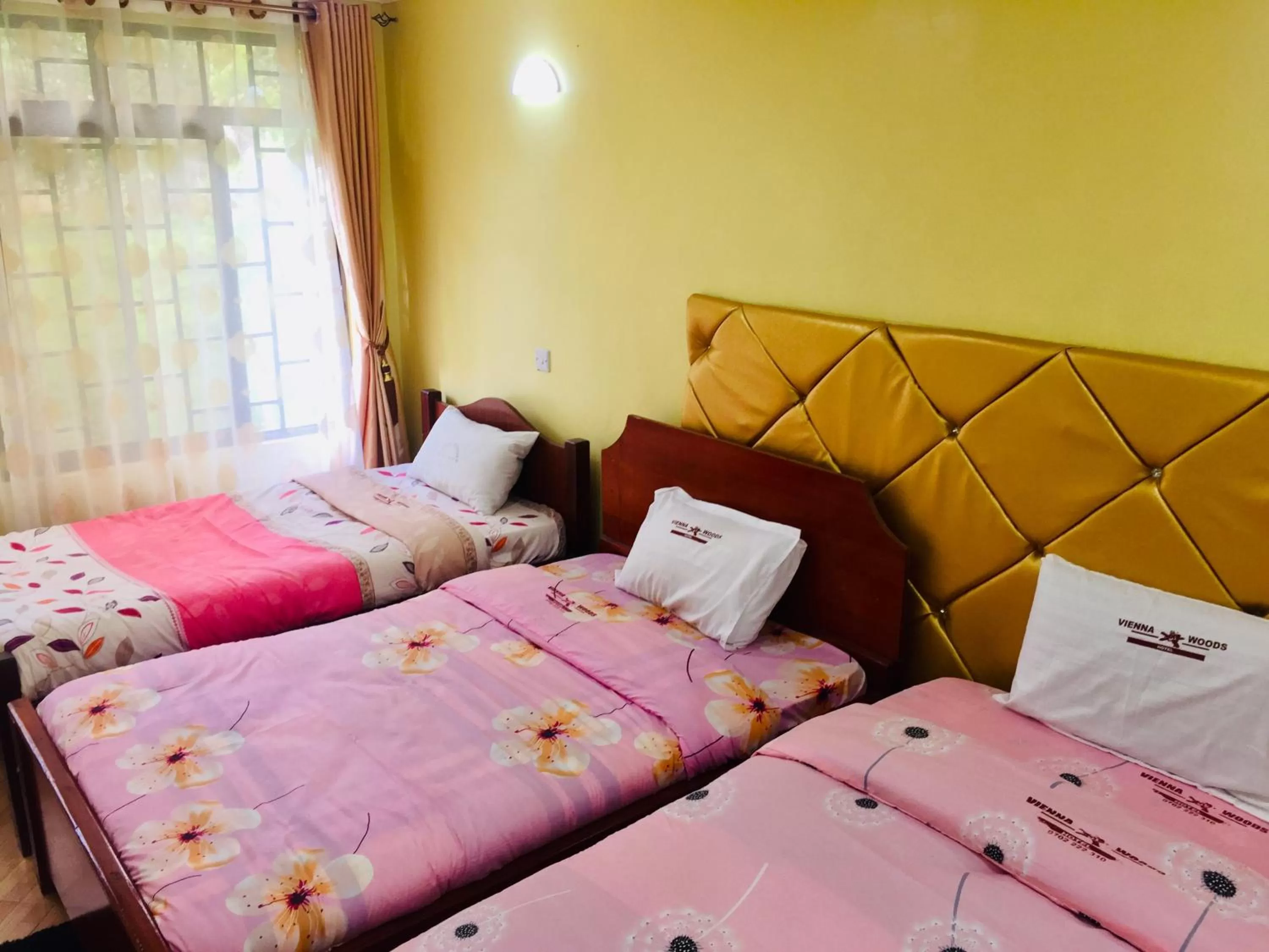 Bed in Vienna Woods Hotel Nakuru