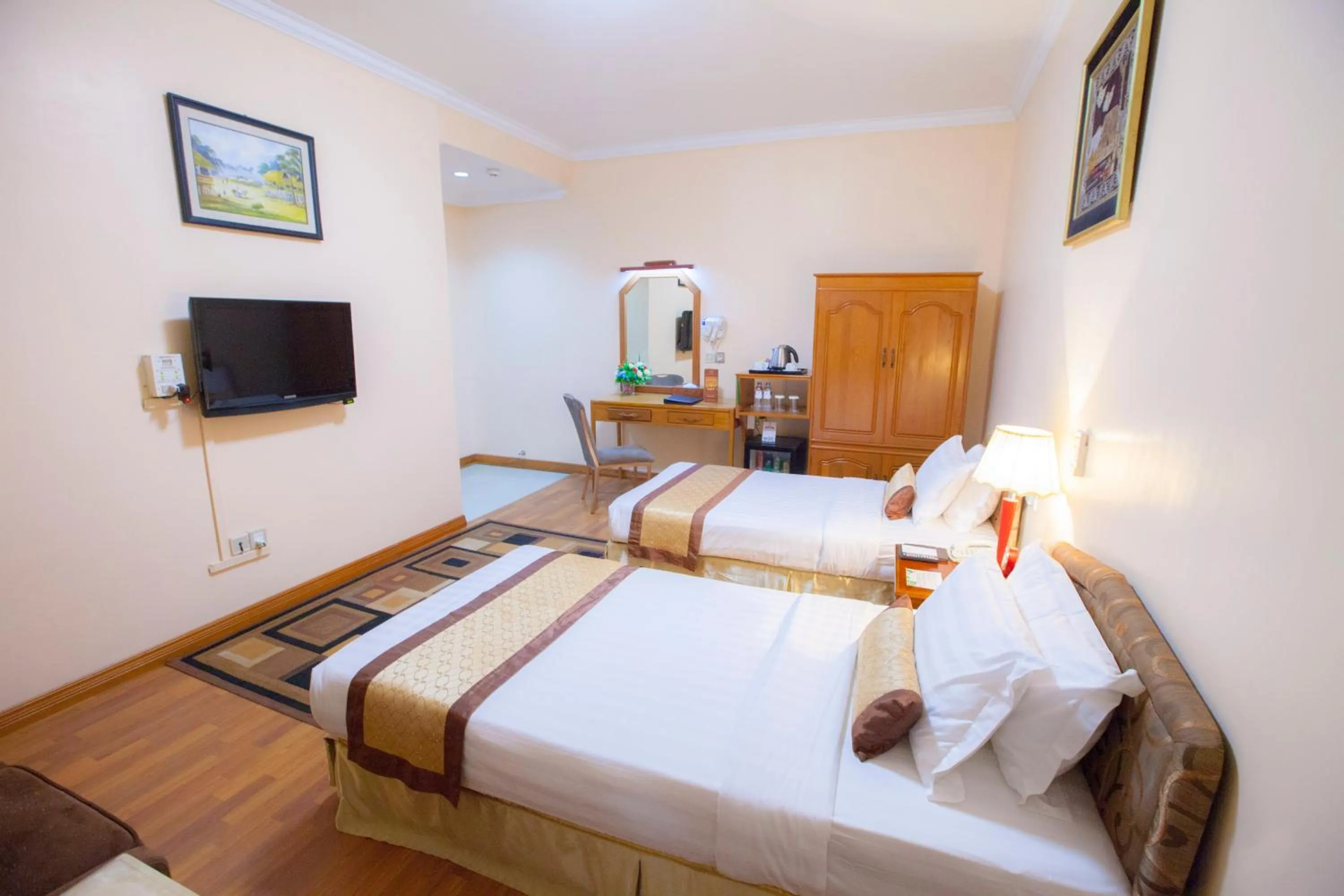 Bed in Grand Palace Hotel