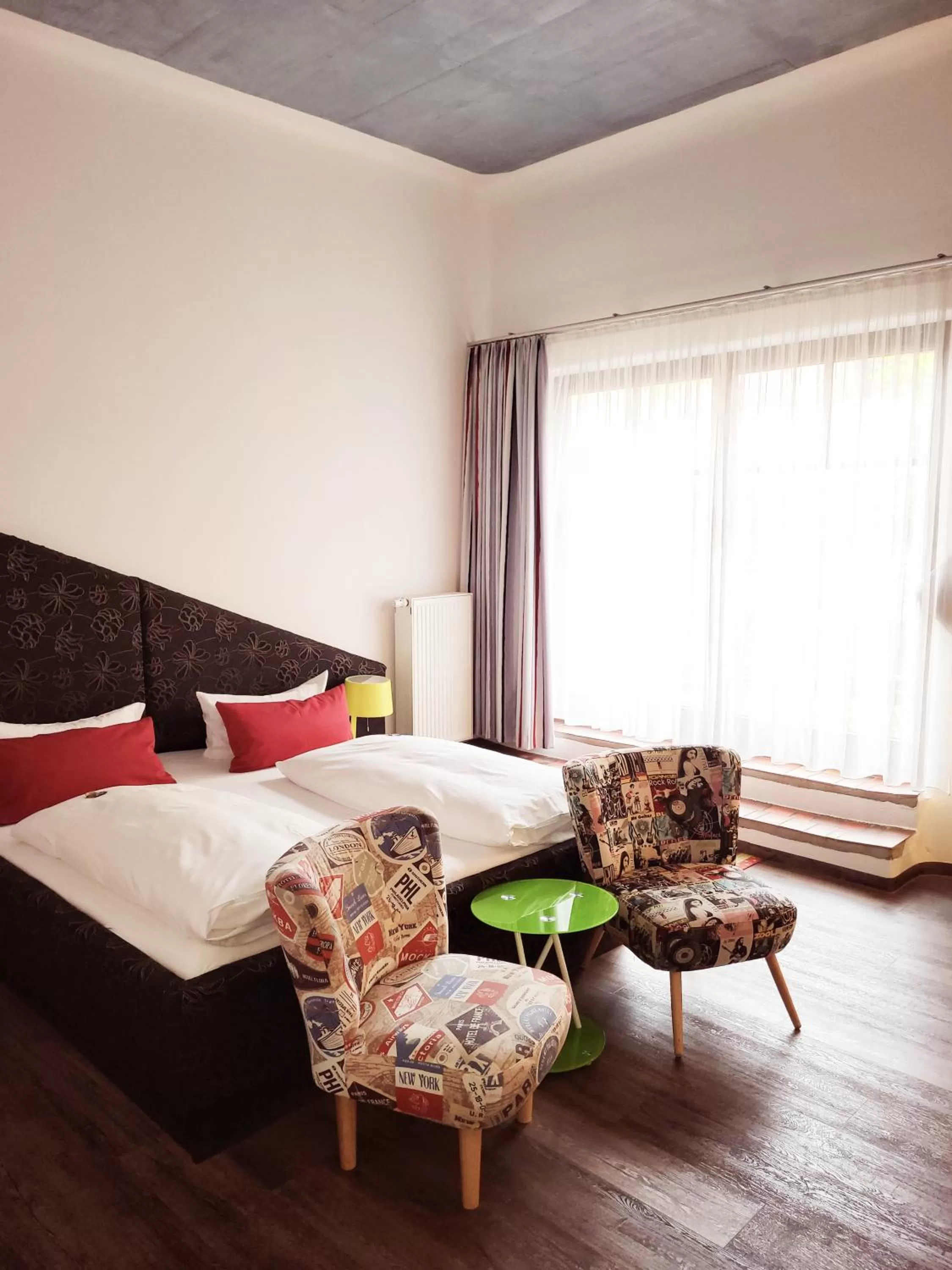 Photo of the whole room, Bed in artHOTEL Magdeburg