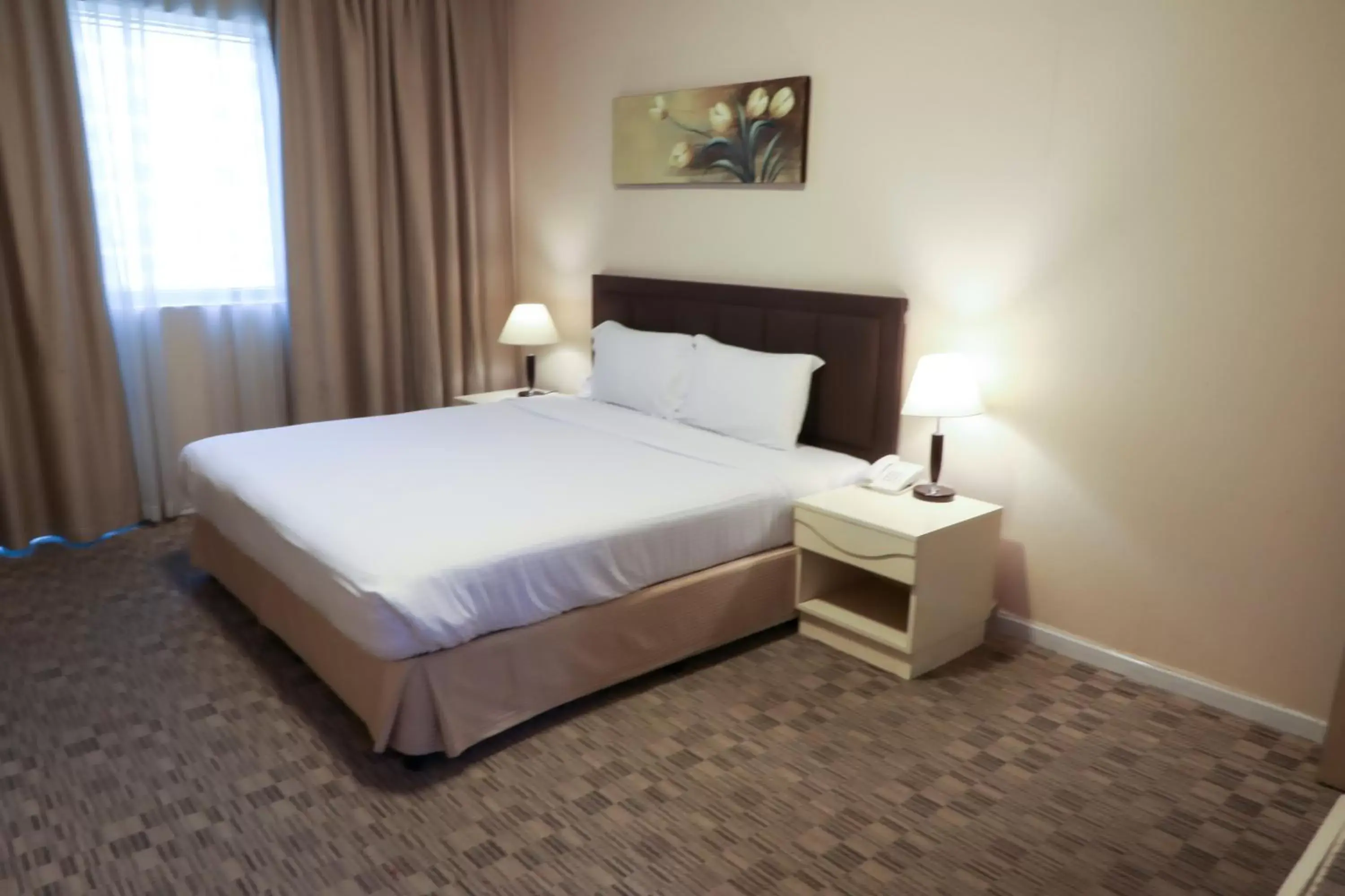Bed in West Zone Pearl Hotel Apartment