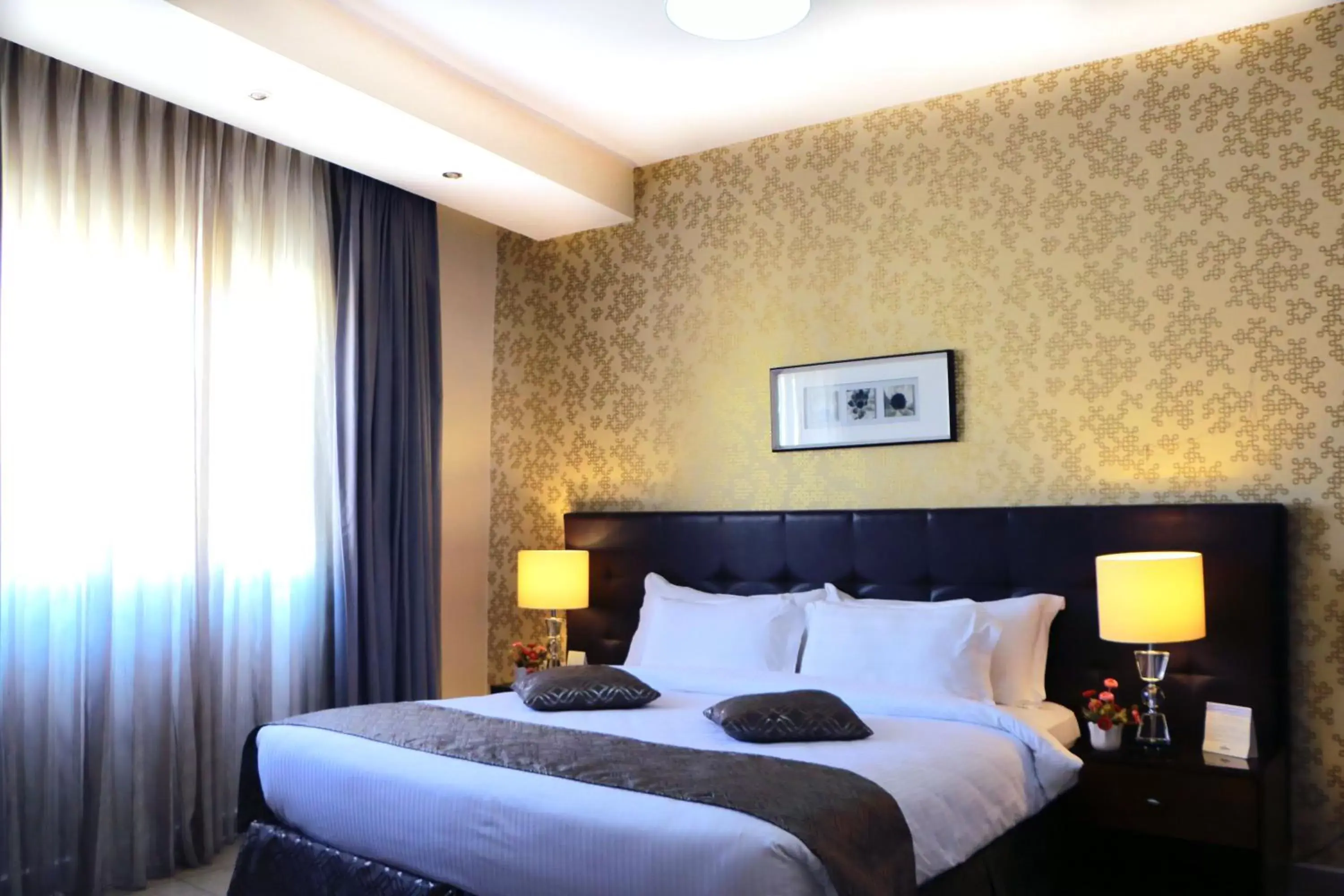 Bed in City Rose Hotel Suites Bed in City Rose Hotel Suites