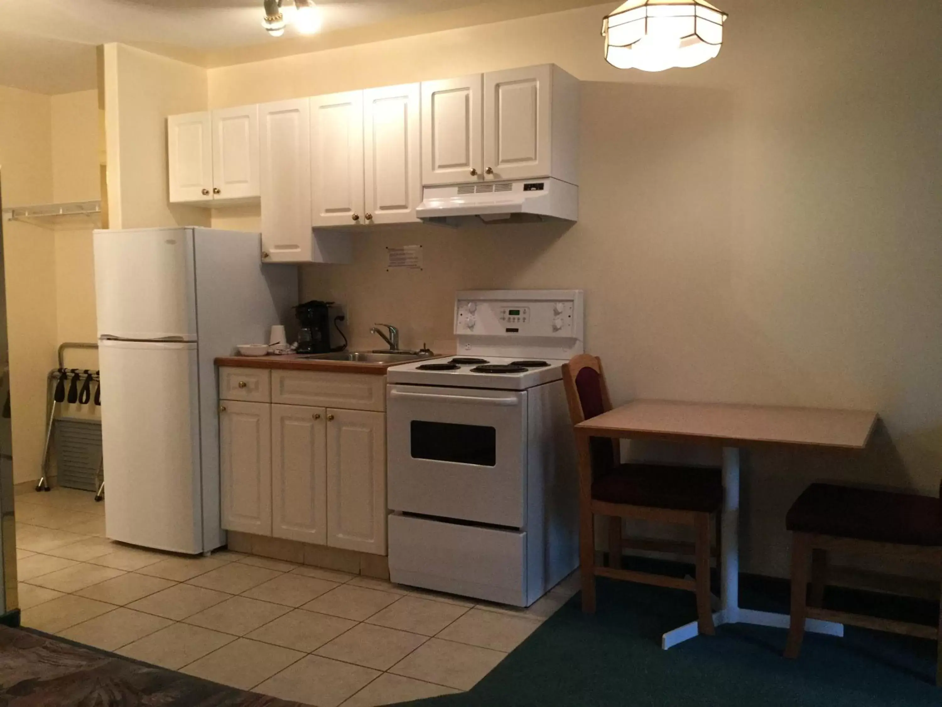 Kitchen or kitchenette, Kitchen/Kitchenette in Western Budget Motel East Red Deer