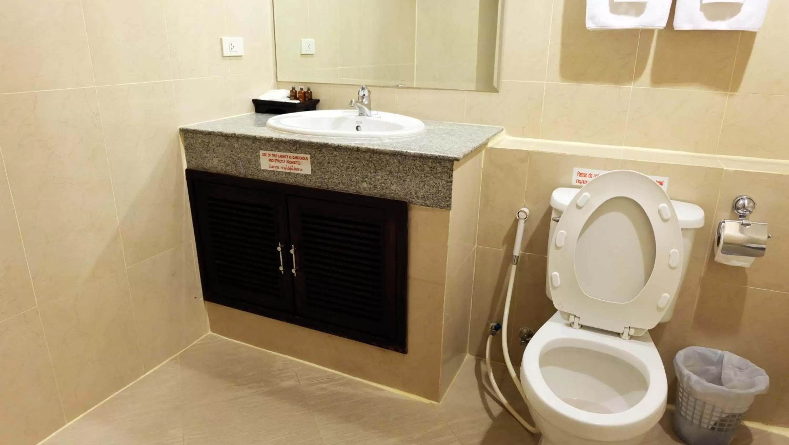 Toilet in Grand Business Inn