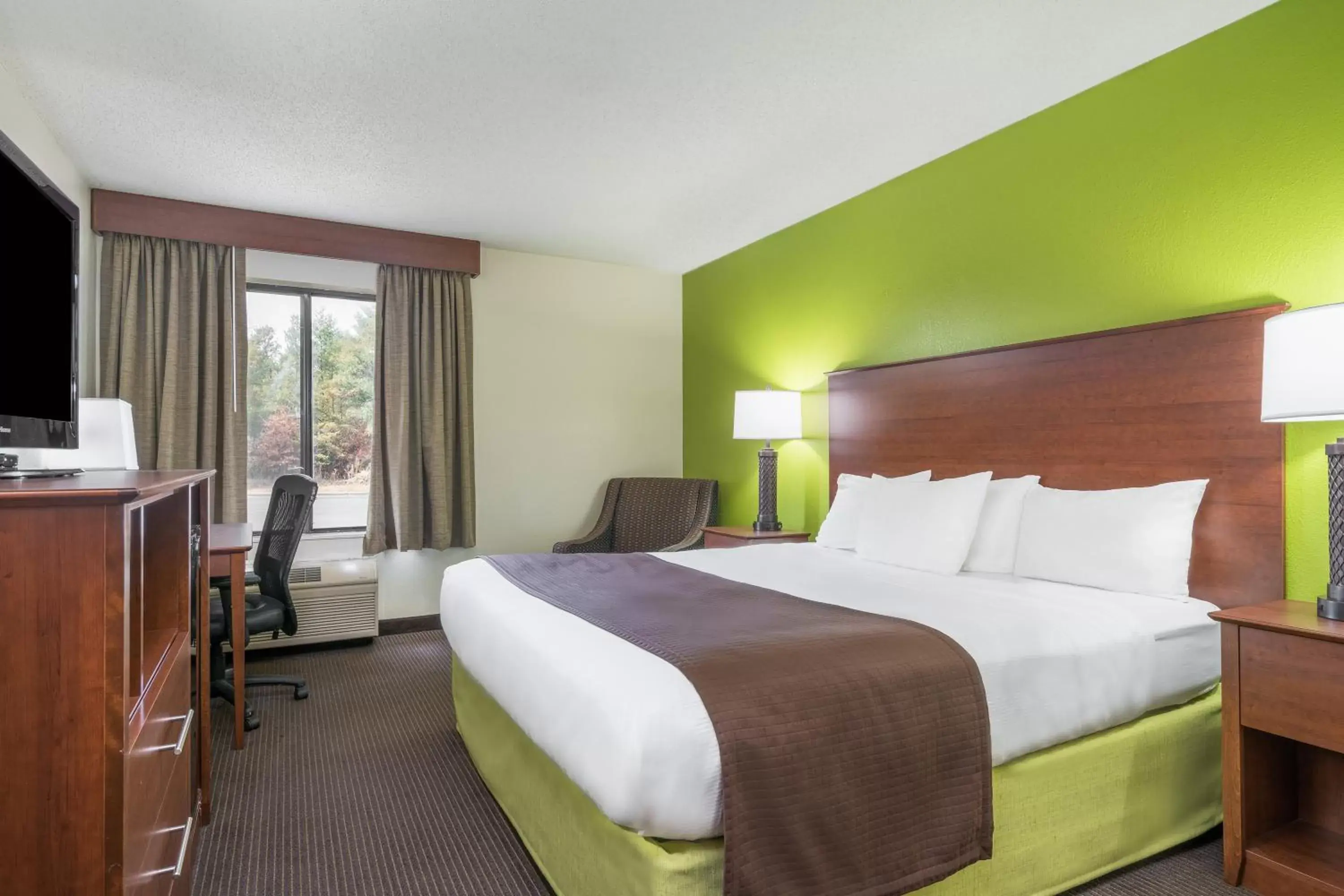 Photo of the whole room, Bed in AmericInn by Wyndham Black River Falls I-94 on ATV Trail