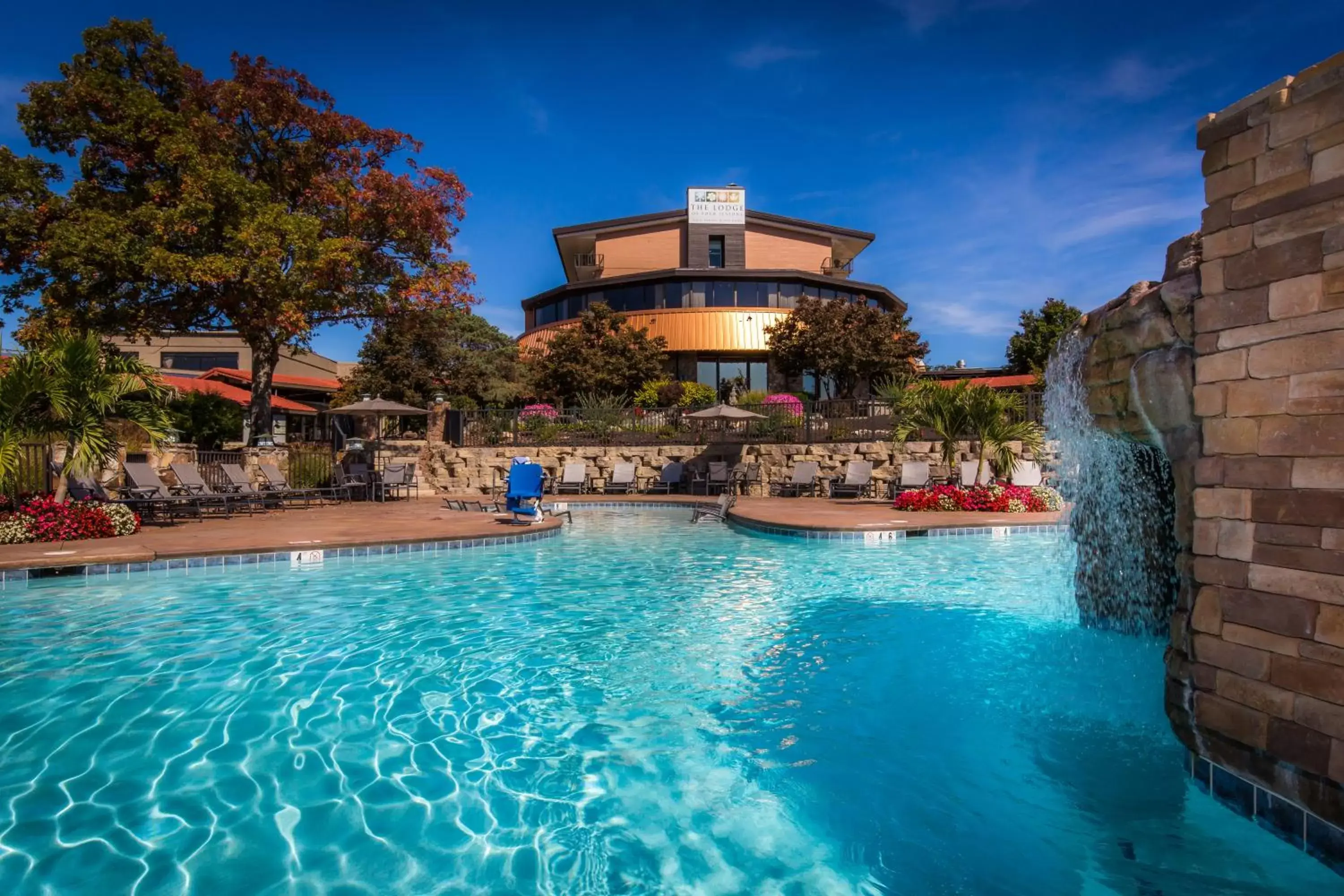 Property building, Swimming Pool in Lodge of Four Seasons Golf Resort, Marina & Spa