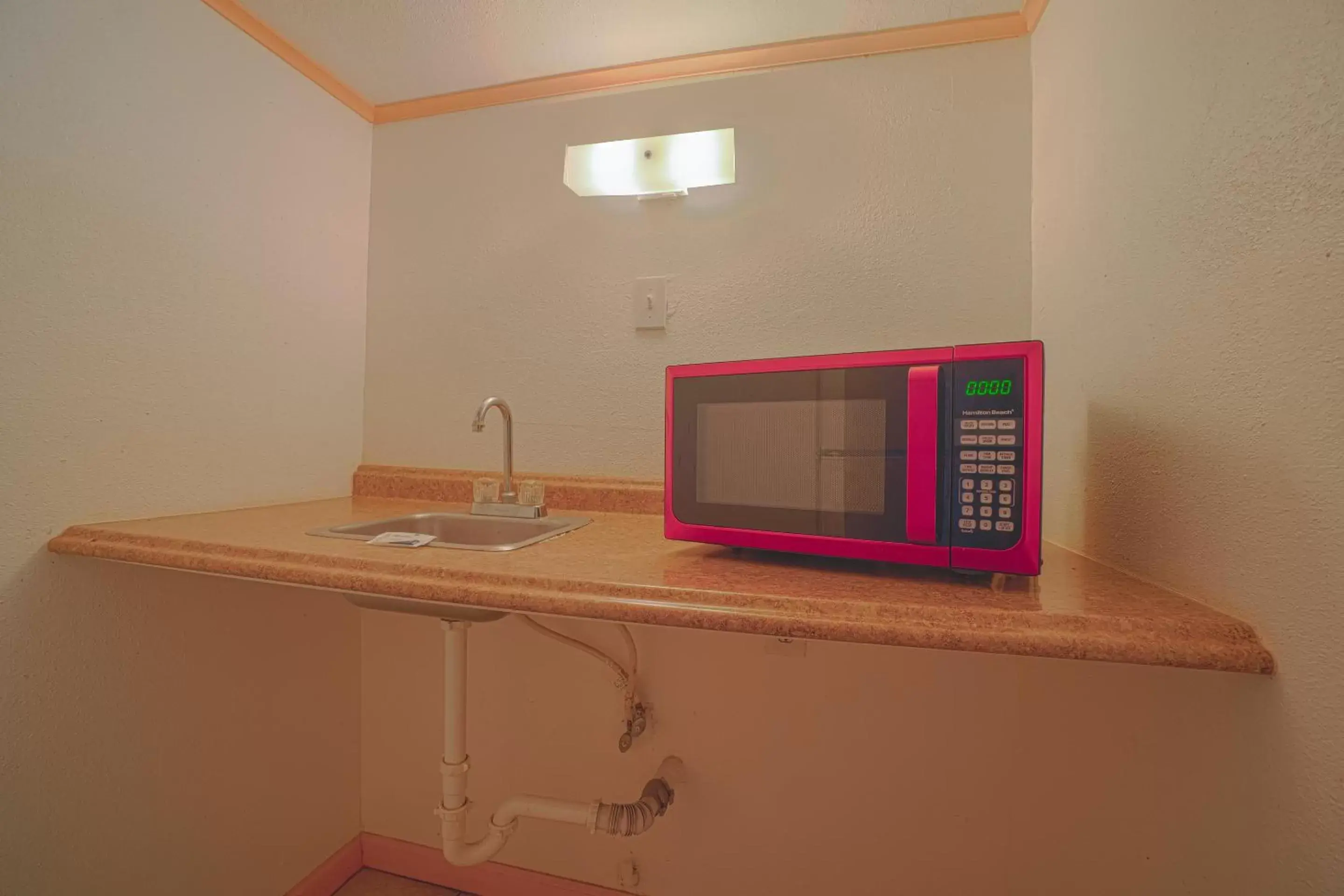 minibar, Kitchen/Kitchenette in Monterrey Motel Padre Island, Corpus Christi BY OYO