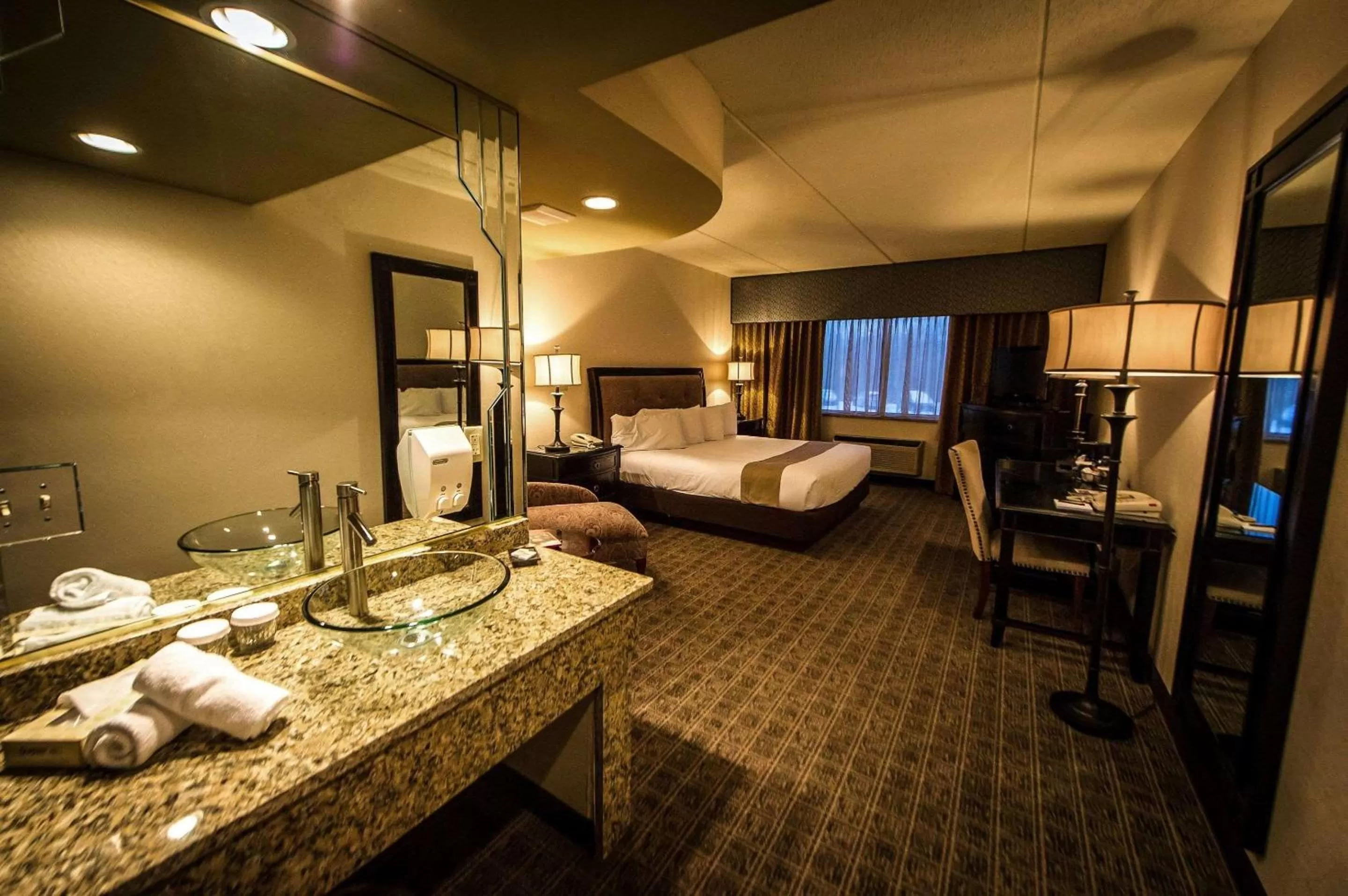 Photo of the whole room, Bed in Garden Place Hotel