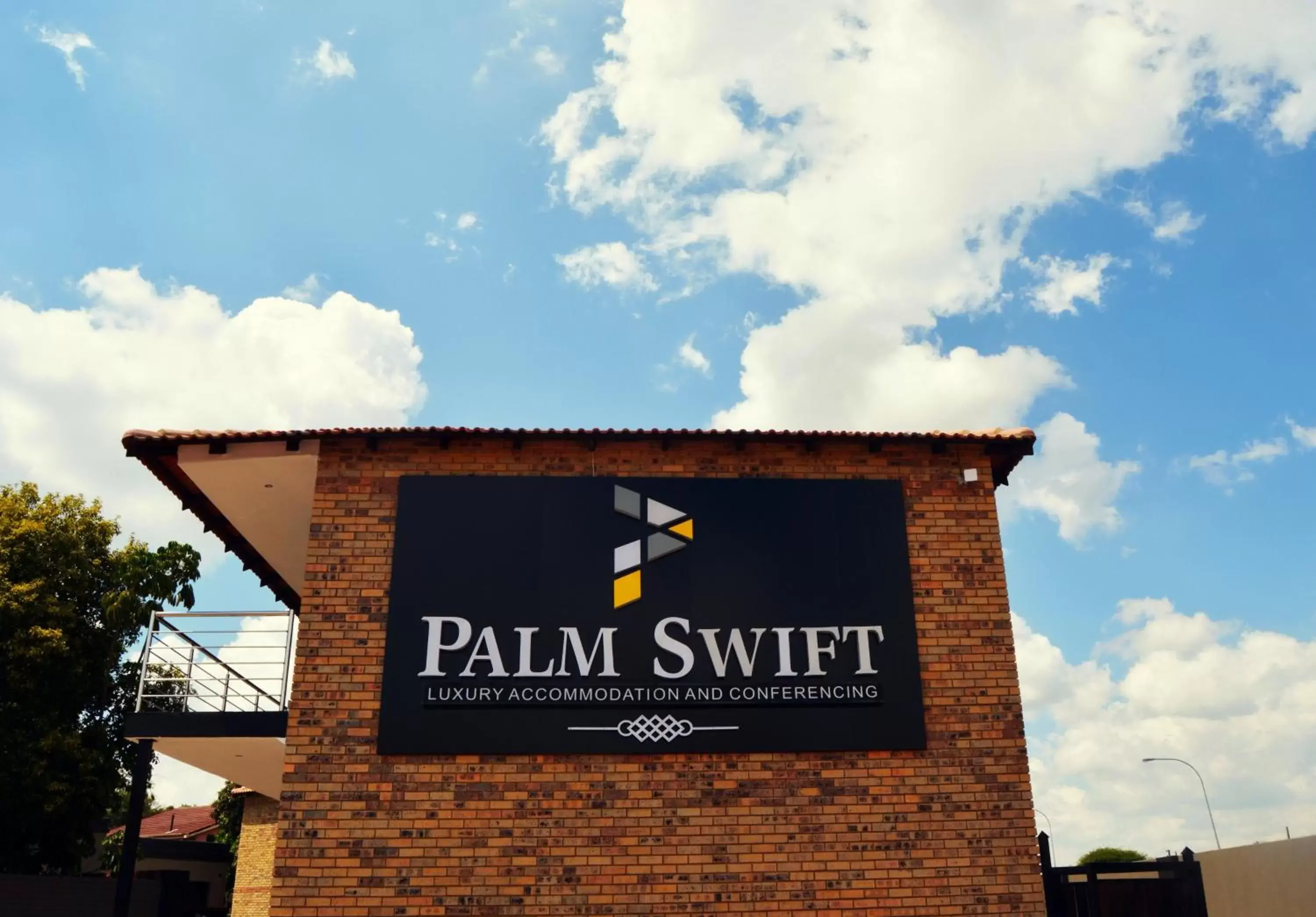 Property Logo/Sign in Palm Swift Luxury Accommodation