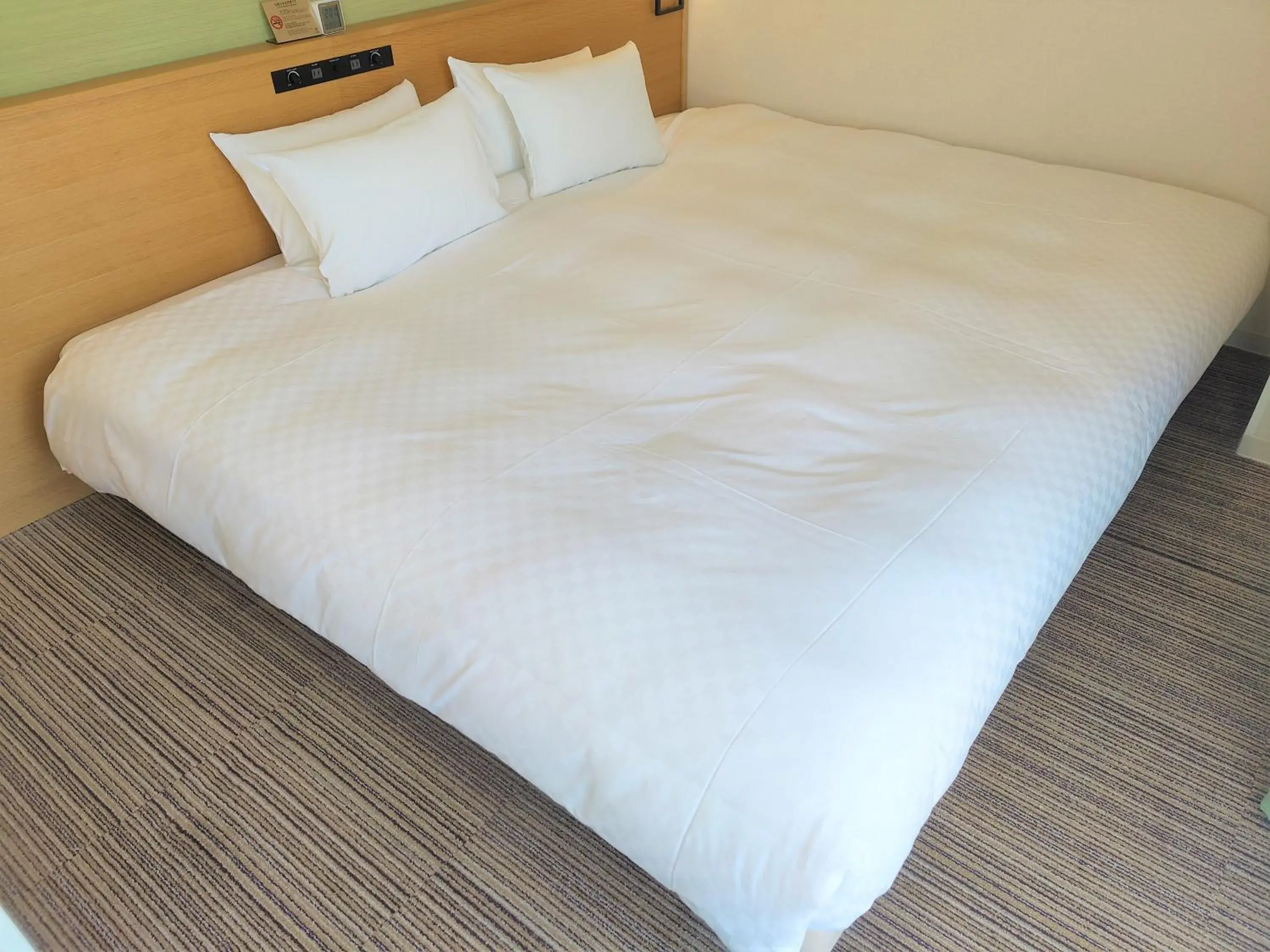 Bed in Candeo Hotels Hiroshima Hatchobori