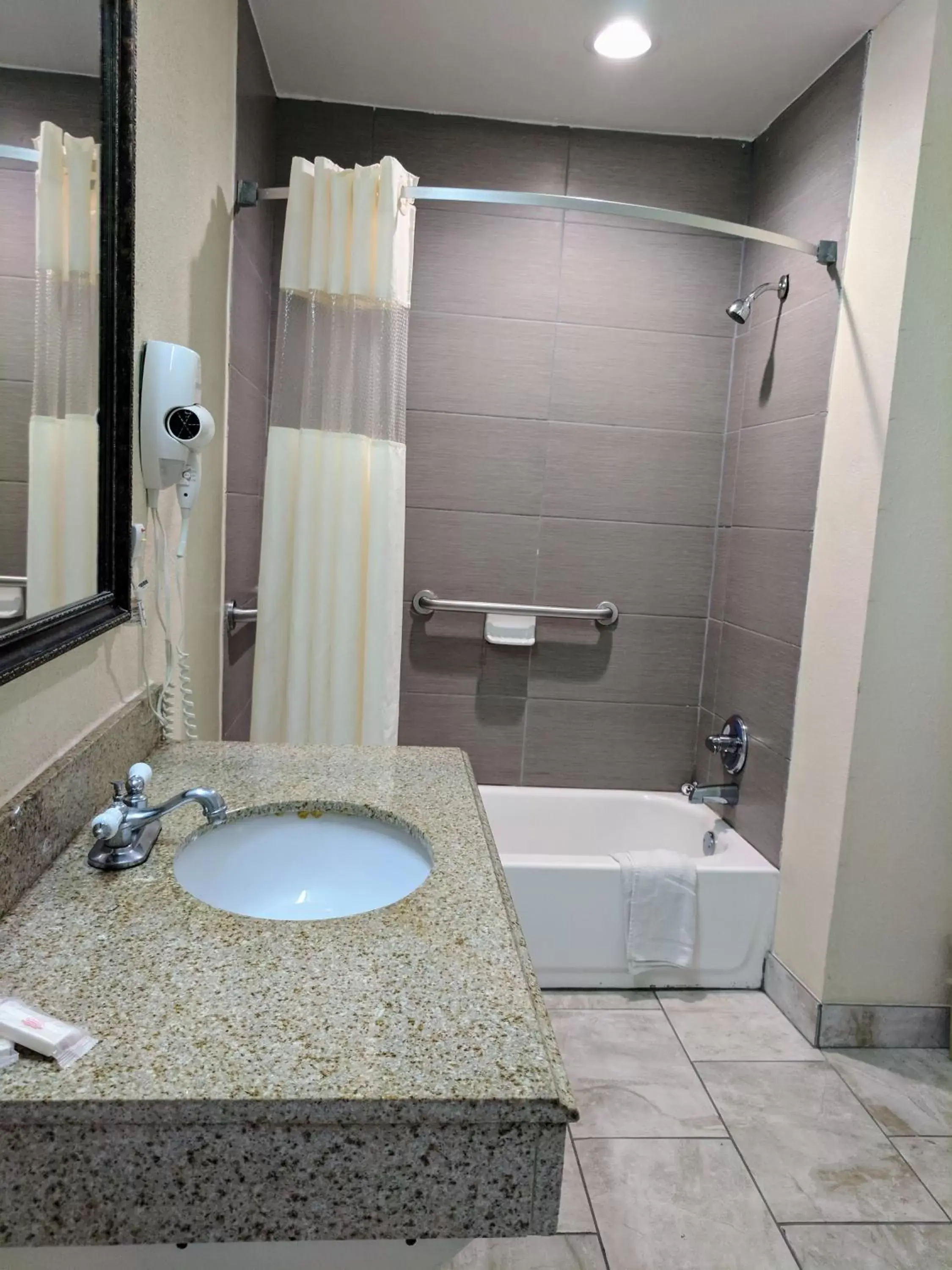 Bathroom in Days Inn by Wyndham San Antonio Interstate Hwy 35 North