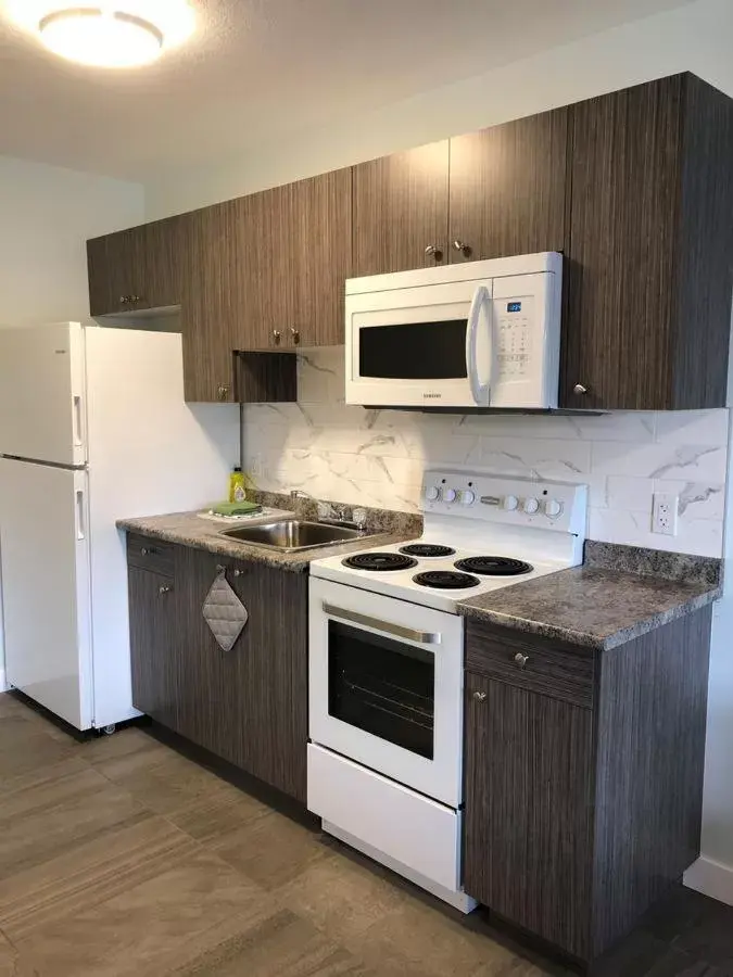 Kitchen/Kitchenette in Onoway Inn and Suites