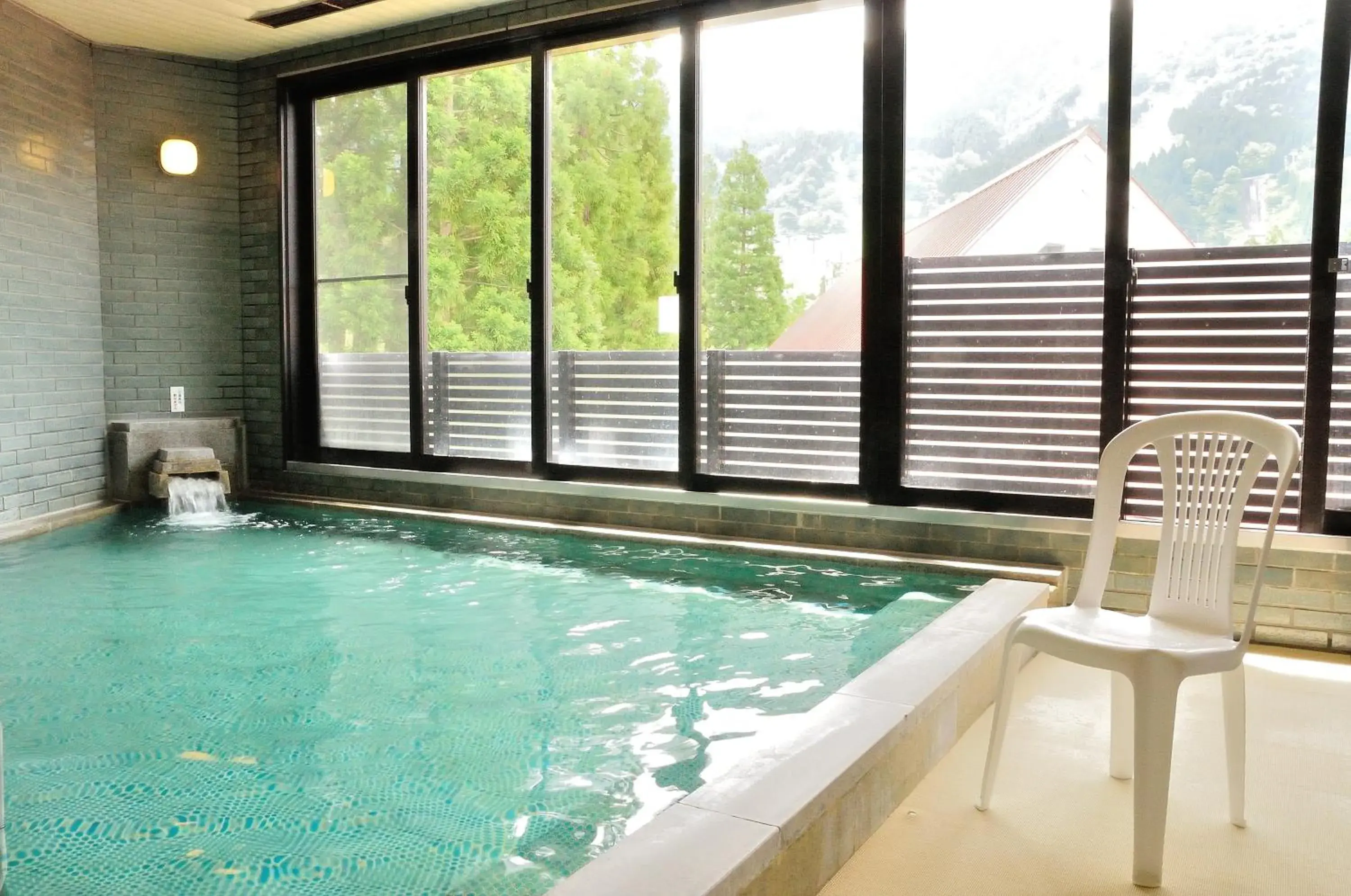 Hot Spring Bath, Swimming Pool in Tateyama Kokusai Hotel