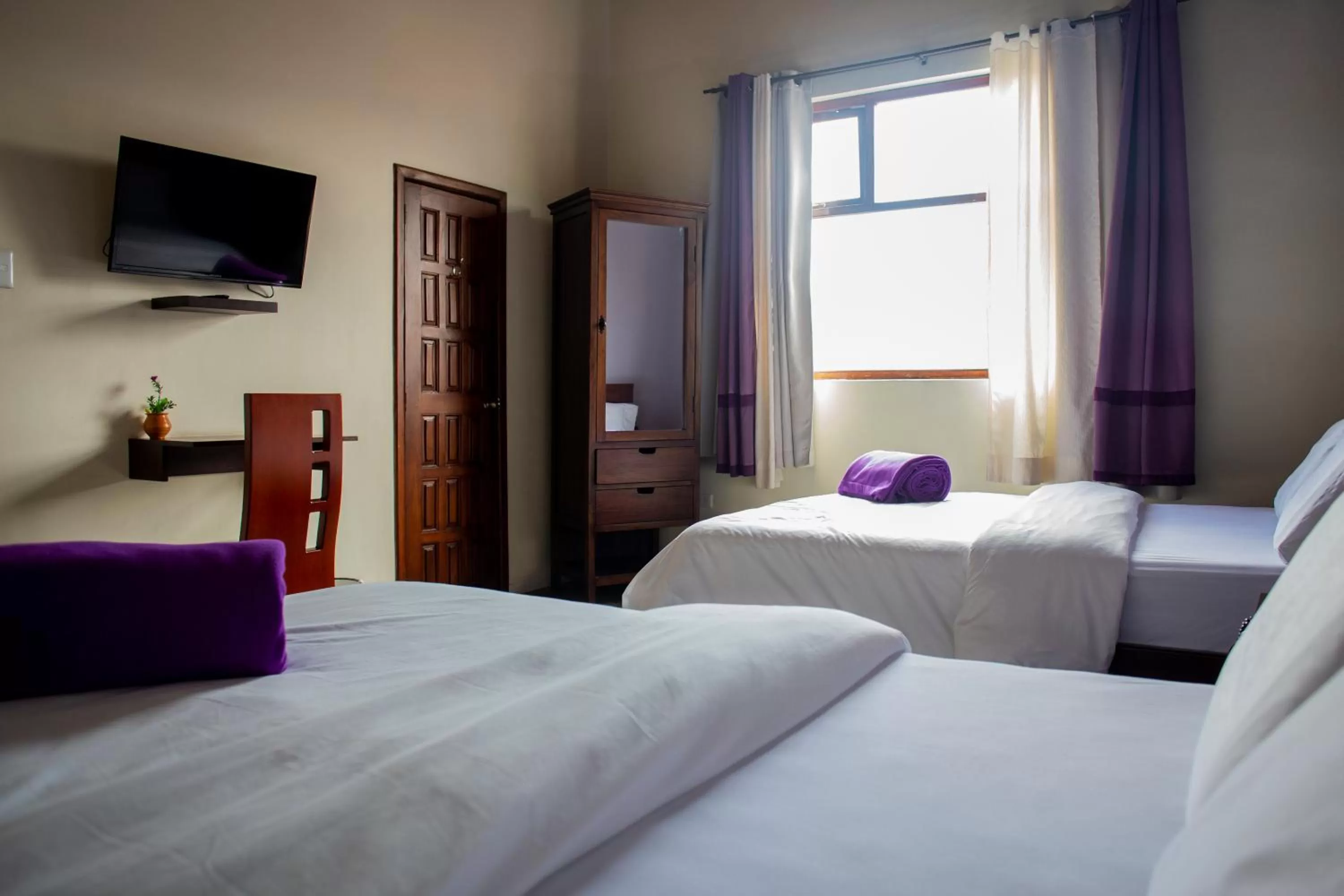 Bed in Hotel Colonial San Agustin