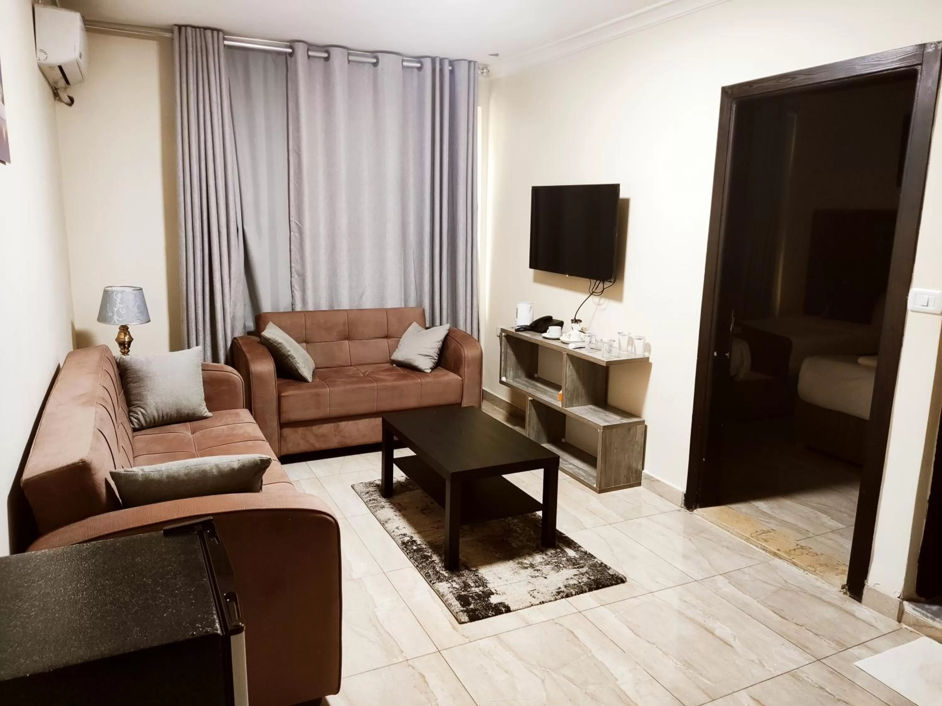 Living room in Golden Plaza Hotel