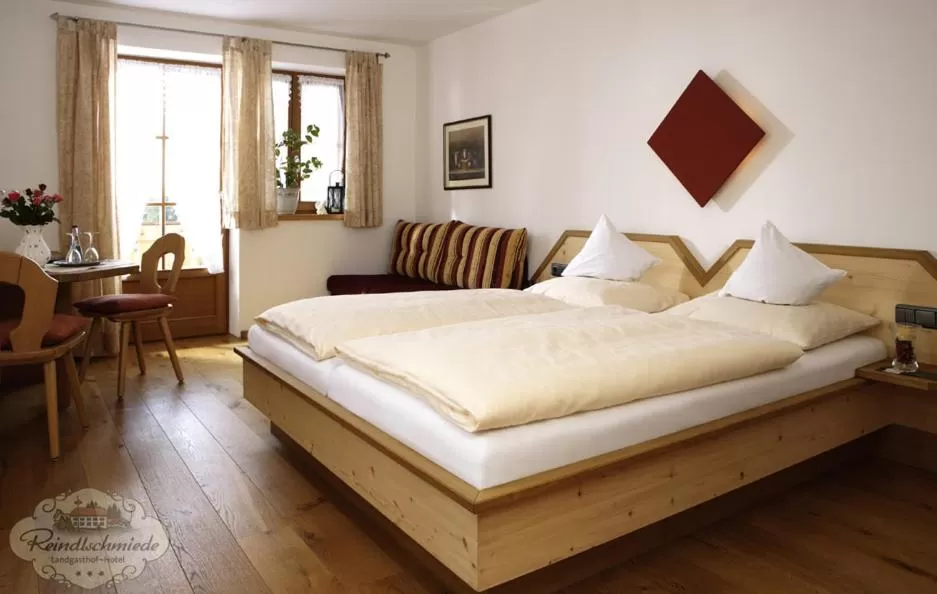 Bed in Landgasthof - Hotel Reindlschmiede