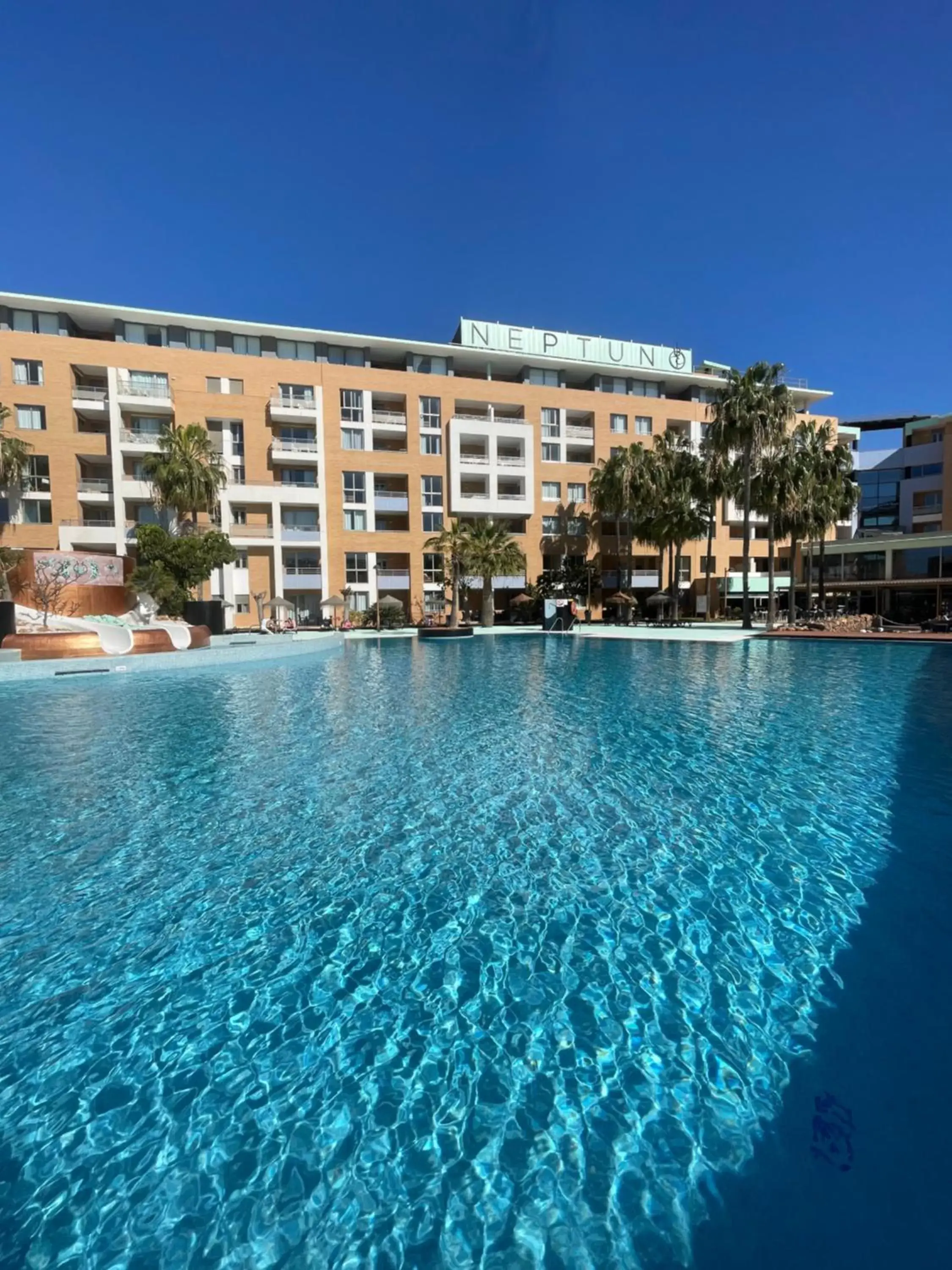 Swimming pool, Property Building in Hotel Neptuno by ON GROUP