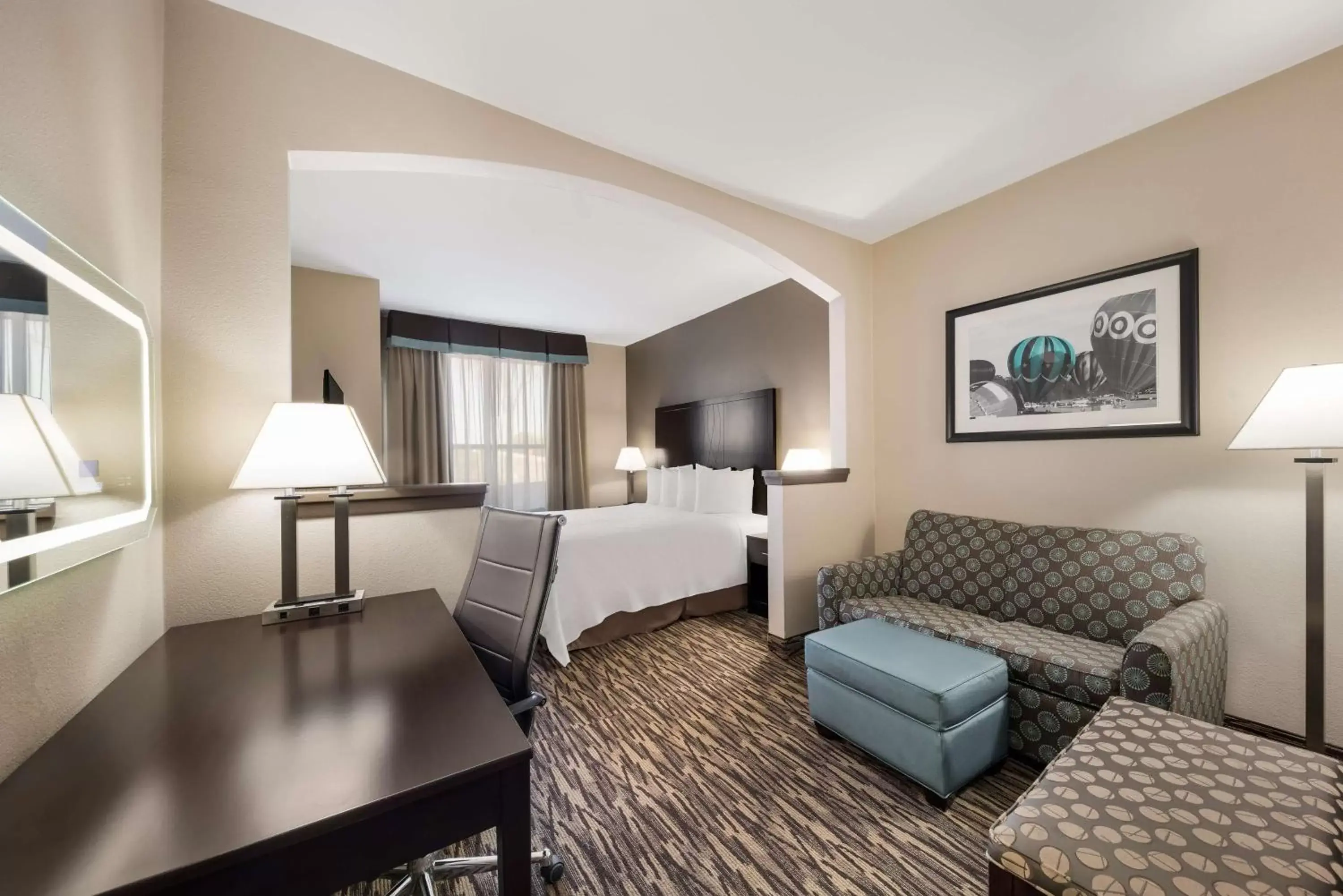 Bedroom, Seating Area in SureStay Plus Hotel by Best Western Plano